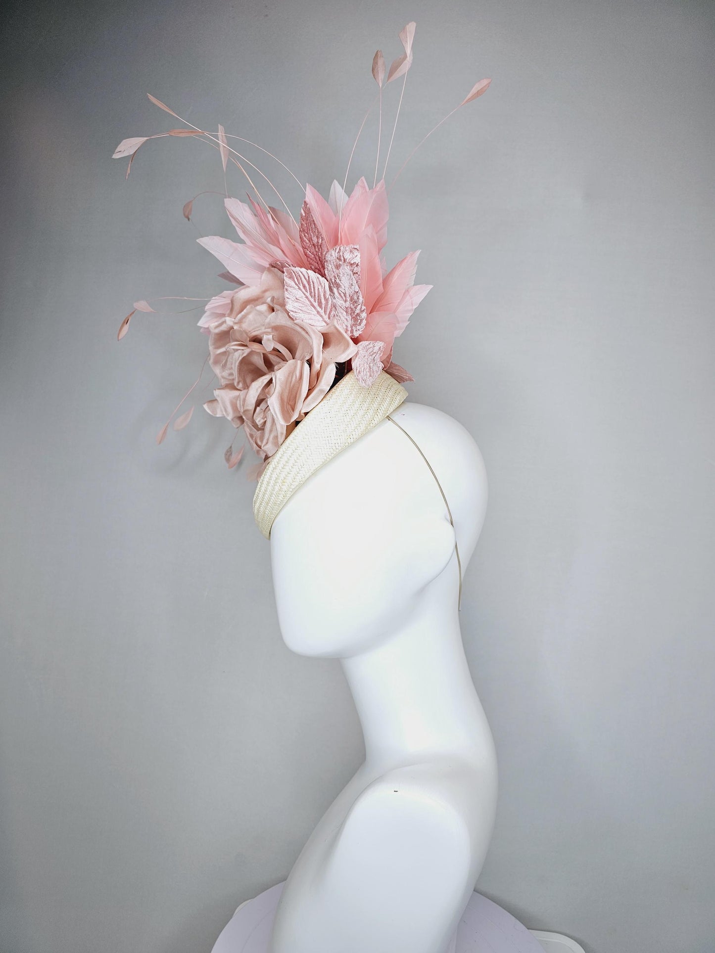 kentucky derby hat fascinator ivory white woven base,dusty pink satin silk rose flower,light pink branching feathers and light pink leaves