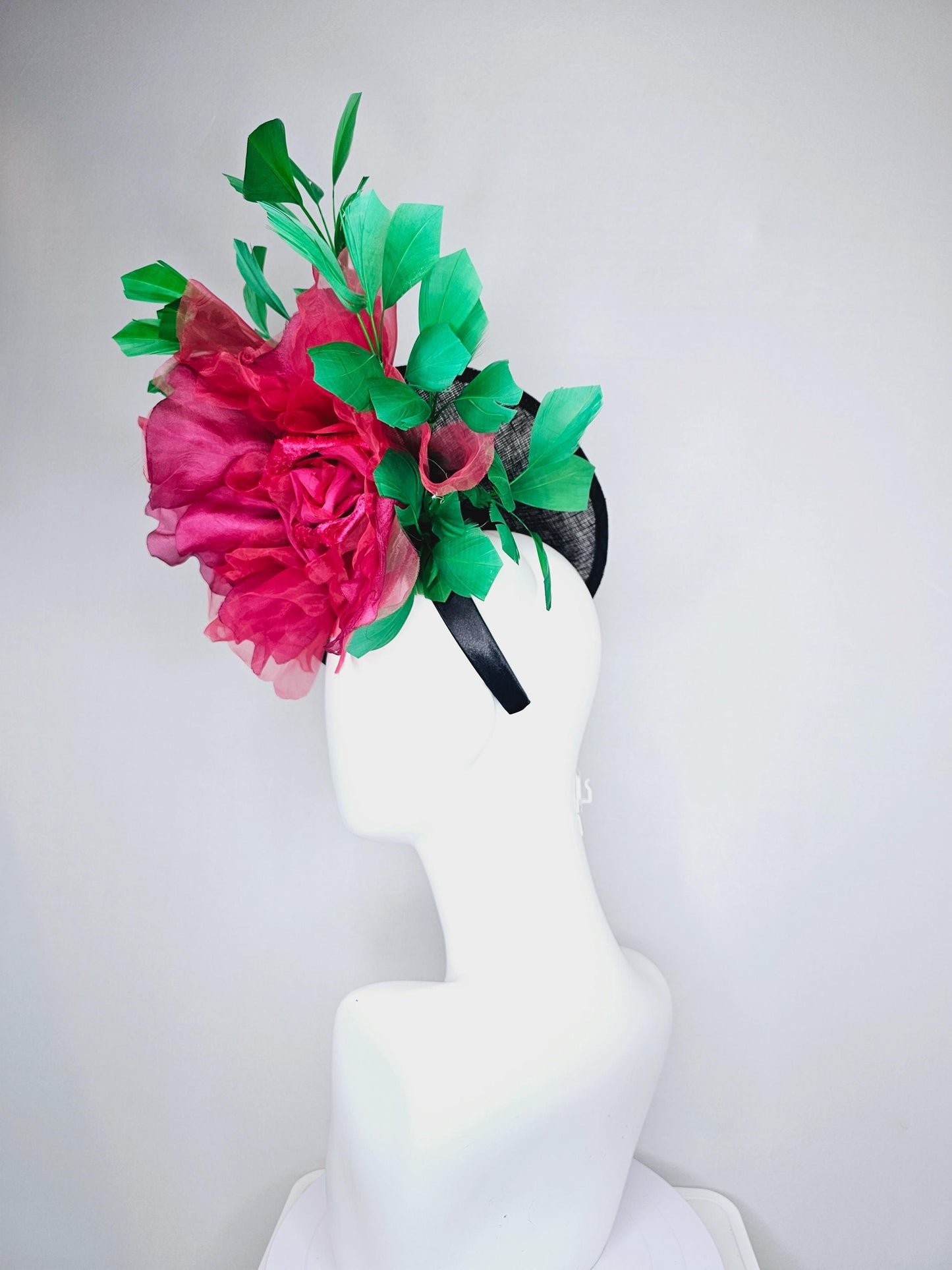 kentucky derby hat fascinator black sinamay saucer with large raspberry pink red organza satin rose and emerald green branching feathers