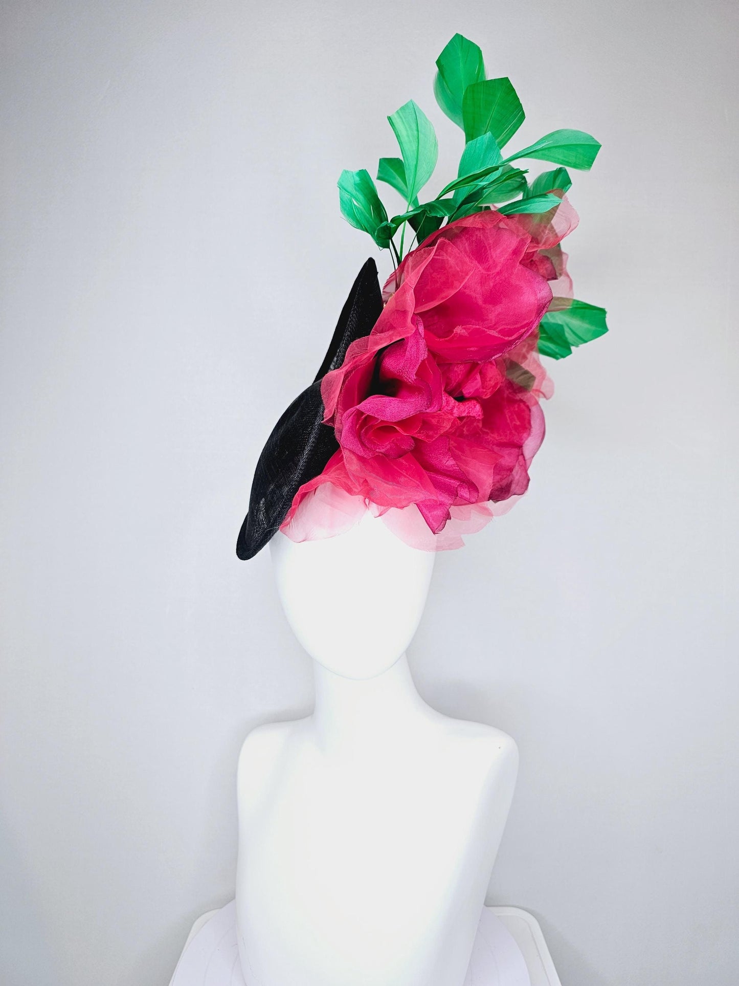 kentucky derby hat fascinator black sinamay saucer with large raspberry pink red organza satin rose and emerald green branching feathers