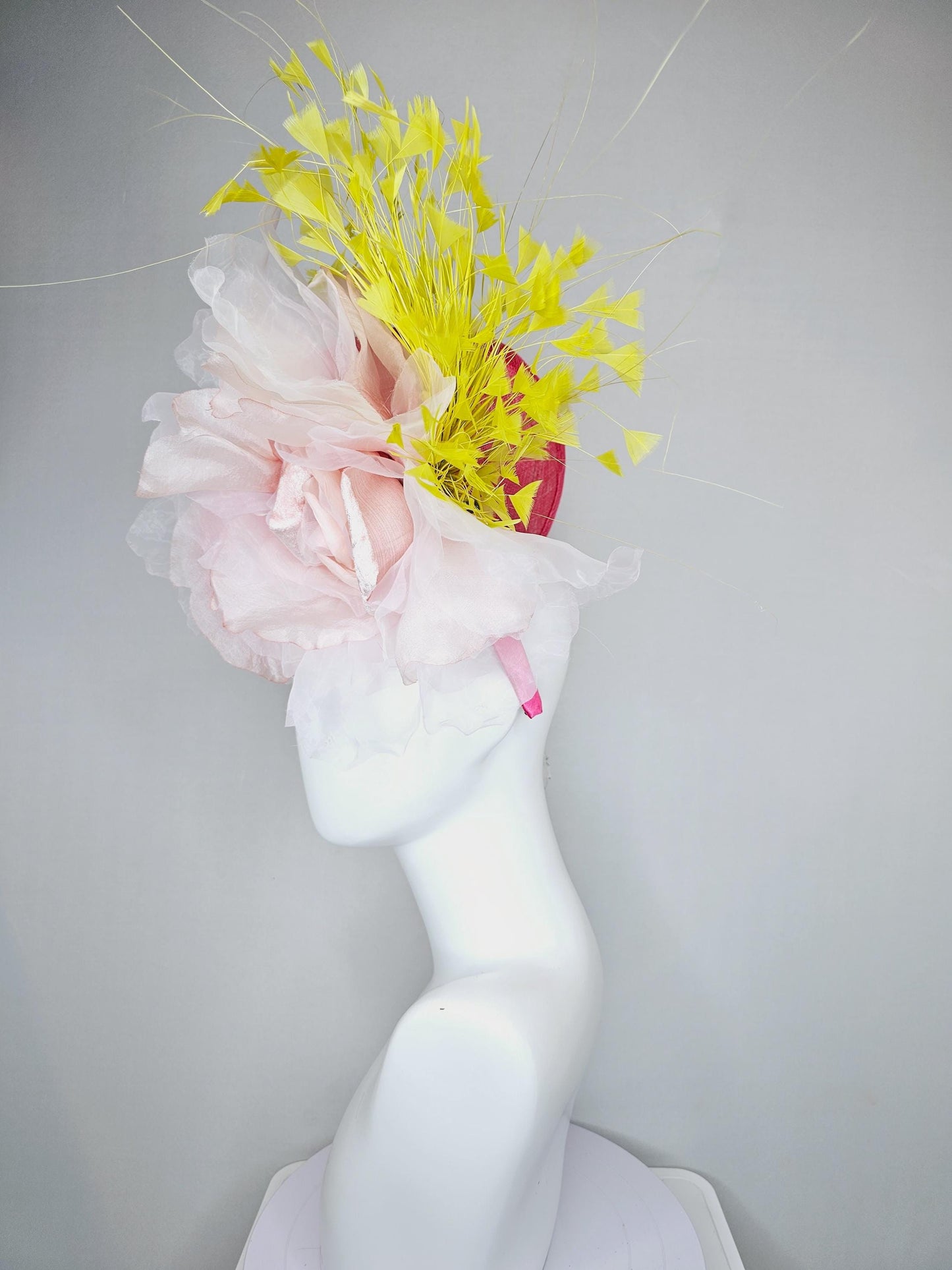 kentucky derby hat fascinator raspberry pink sinamay saucer with large light pale pink organza satin rose and yellow branching feathers