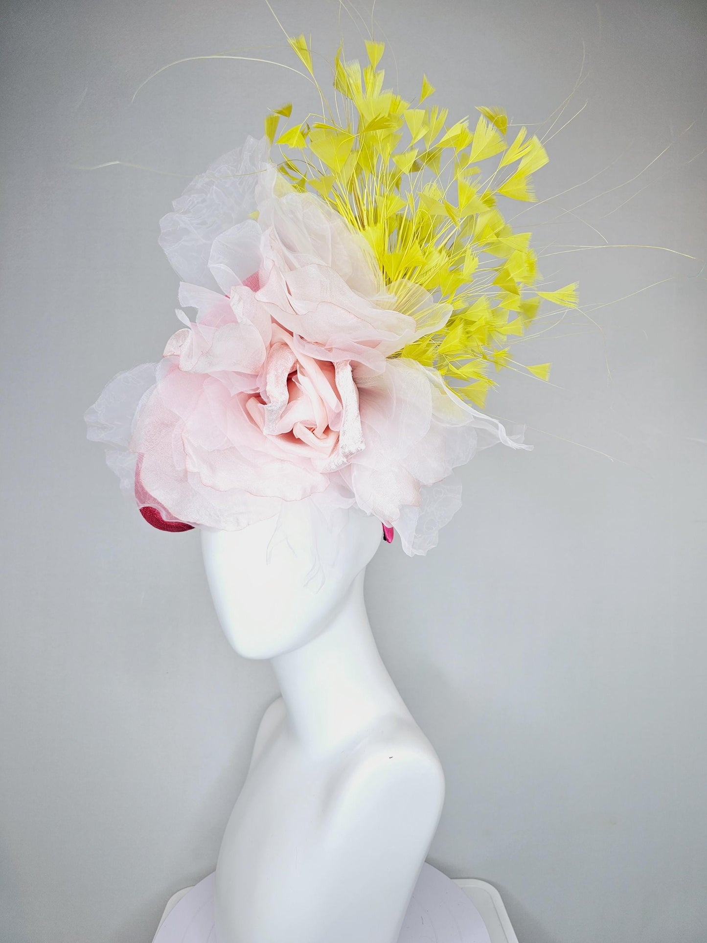 kentucky derby hat fascinator raspberry pink sinamay saucer with large light pale pink organza satin rose and yellow branching feathers