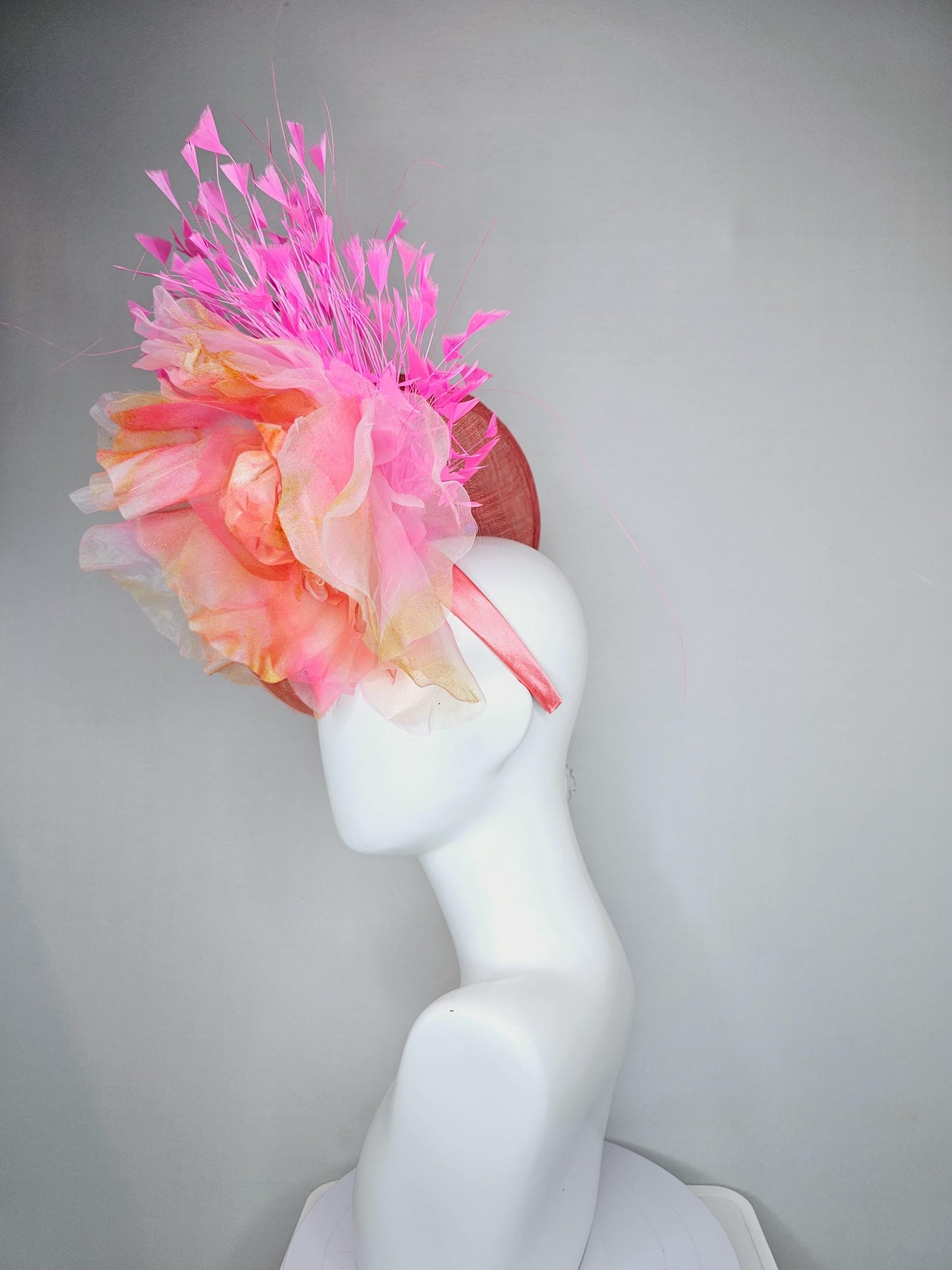 kentucky derby hat fascinator coral orange sinamay saucer with large apricot orange pink tie dye organza satin rose, pink branching feathers