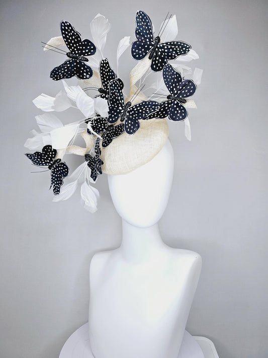 kentucky derby hat fascinator ivory white sinamay with sinamay curls and white branching feathers with black and white feather butterflies