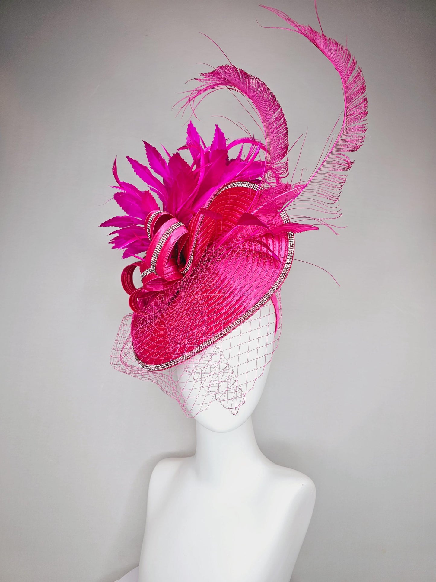 kentucky derby hat fascinator hot pink satin saucer with crystal rhinestone beading and satin beaded bow,and fuchsia pink branching feathers