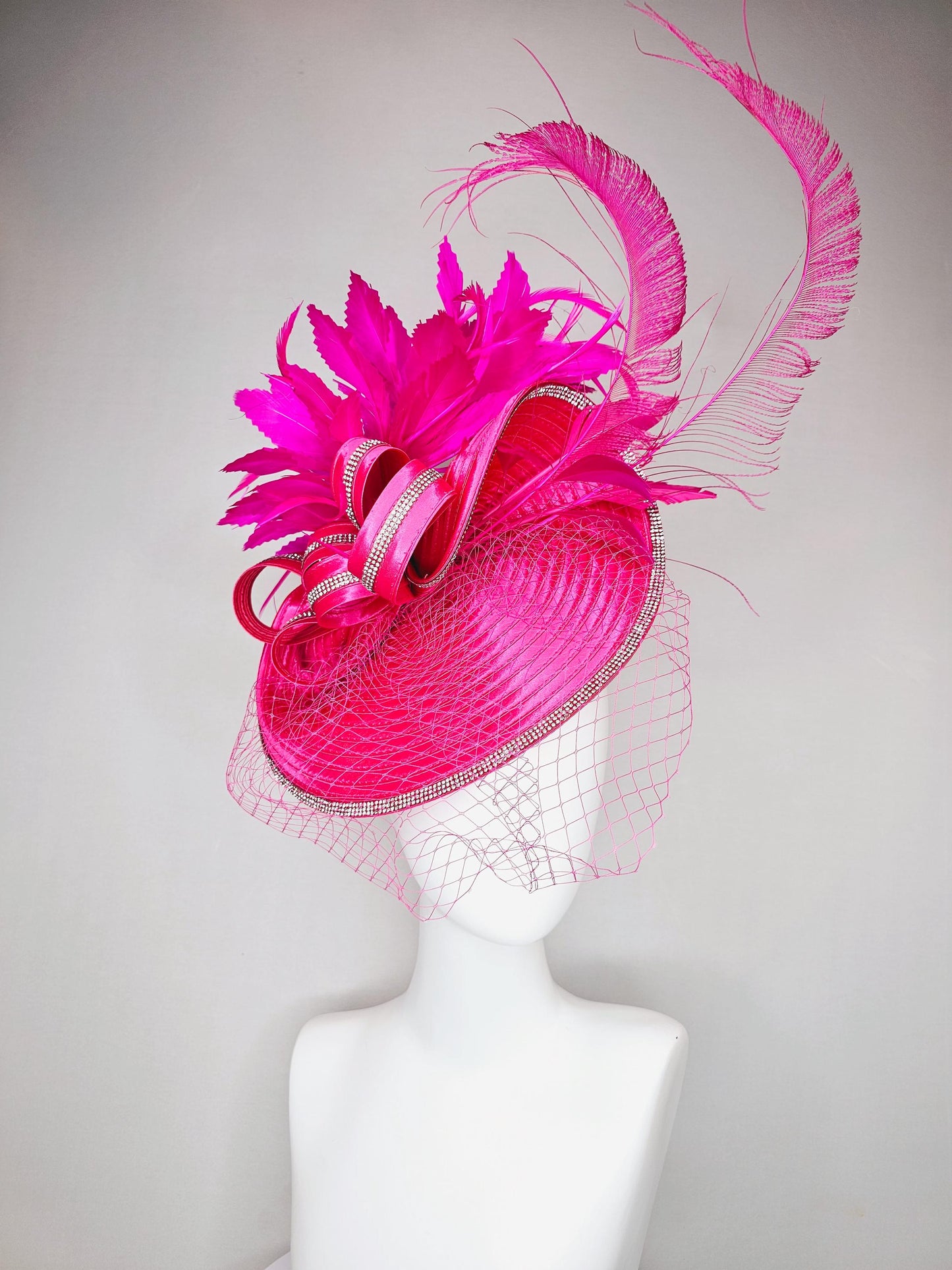 kentucky derby hat fascinator hot pink satin saucer with crystal rhinestone beading and satin beaded bow,and fuchsia pink branching feathers