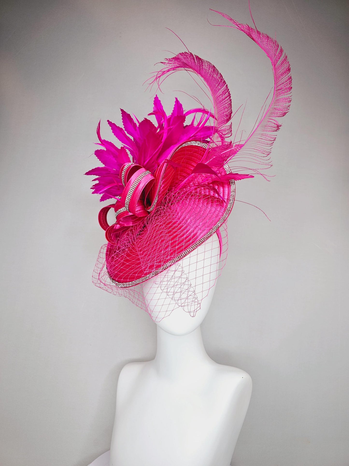 kentucky derby hat fascinator hot pink satin saucer with crystal rhinestone beading and satin beaded bow,and fuchsia pink branching feathers