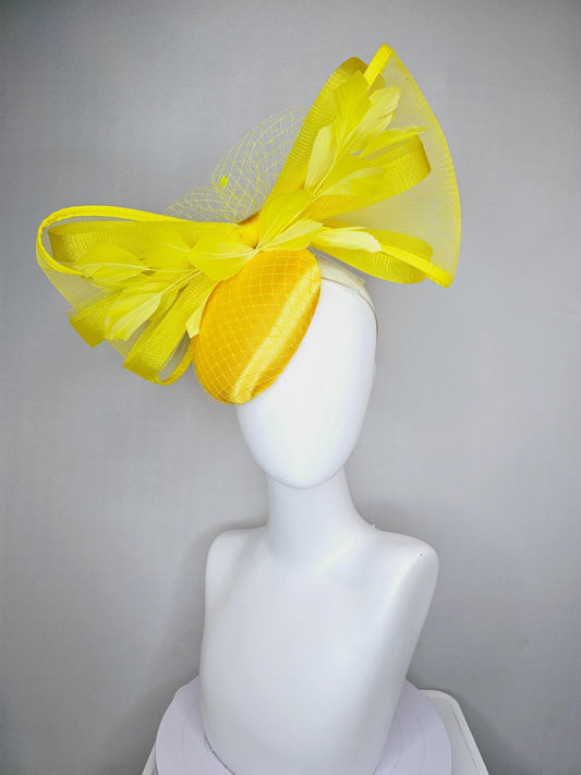 kentucky derby hat fascinator bright yellow satin with netting, branching yellow feathers and large mesh yellow bow