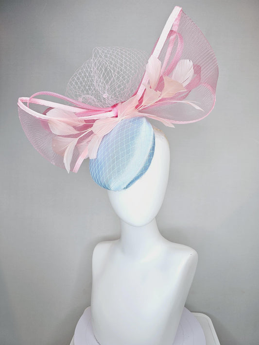 kentucky derby hat fascinator light baby blue satin with netting, branching light blush pink feathers and large mesh blush pink bow