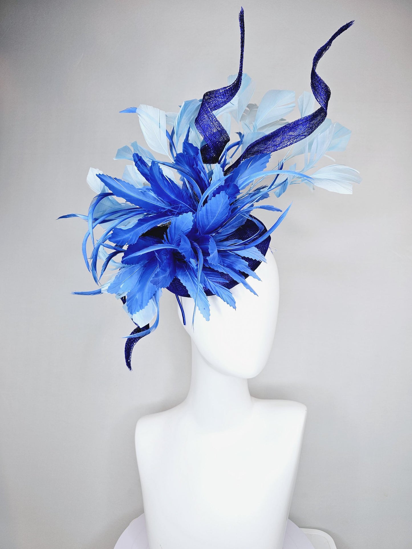 kentucky derby hat fascinator navy blue sinamay, fluffy royal blue zigzag feathers, navy blue sinamay curls, light blue branching feathers