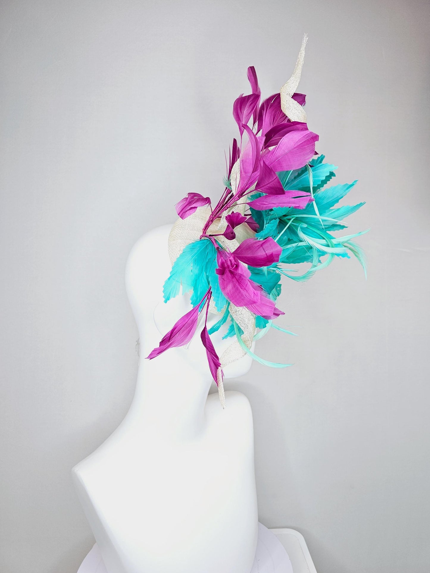 kentucky derby hat fascinator white sinamay, fluffy aqua blue green zigzag feathers, white sinamay curls, magenta purple branching feathers