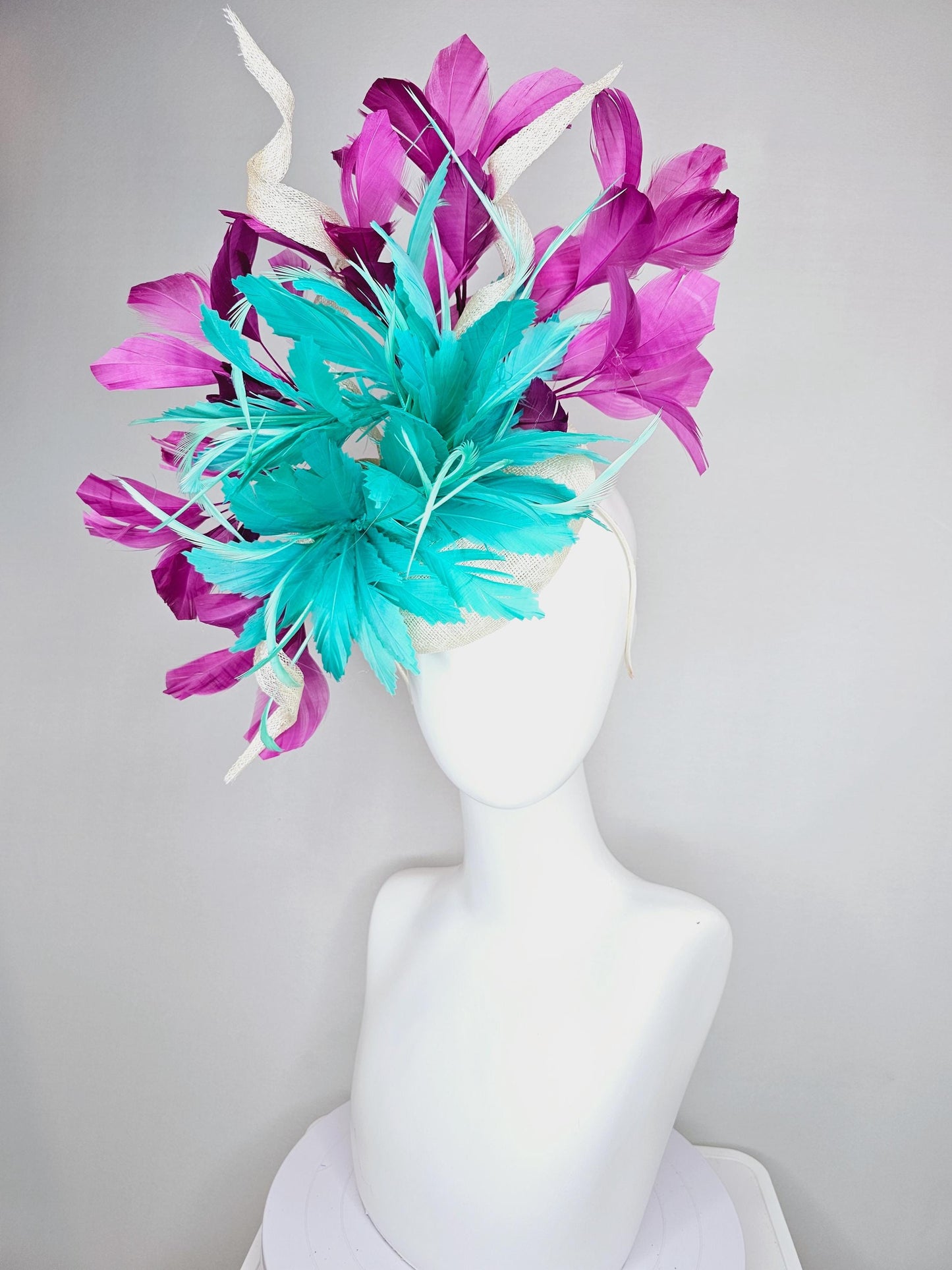 kentucky derby hat fascinator white sinamay, fluffy aqua blue green zigzag feathers, white sinamay curls, magenta purple branching feathers