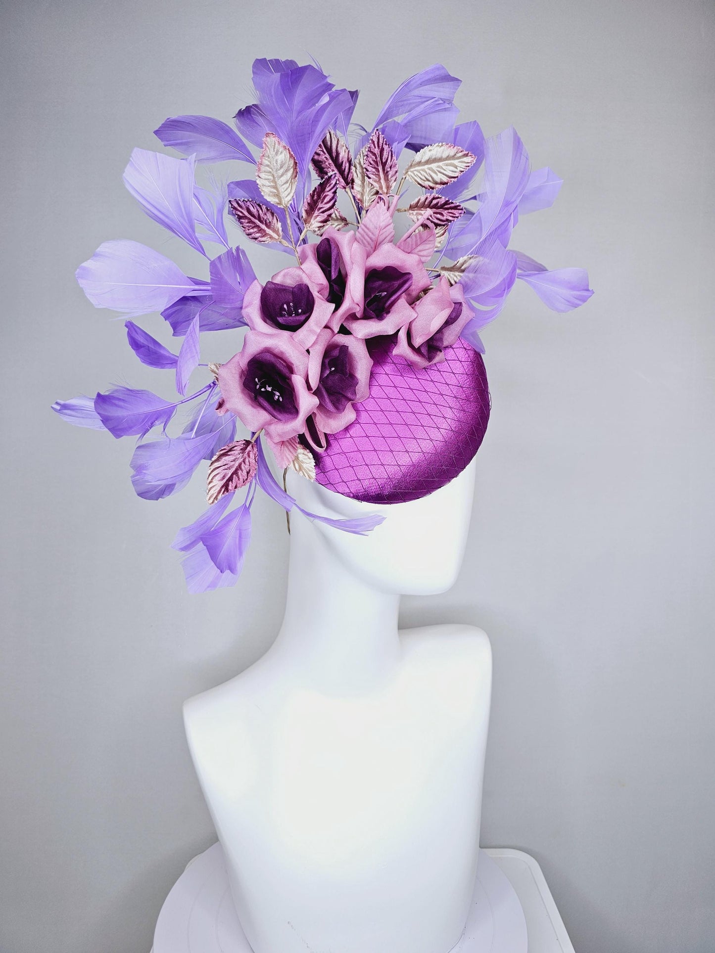 kentucky derby hat fascinator purple satin with netting,purple lilac satin flowers, ombre purple leaves, purple lavender branching feathers