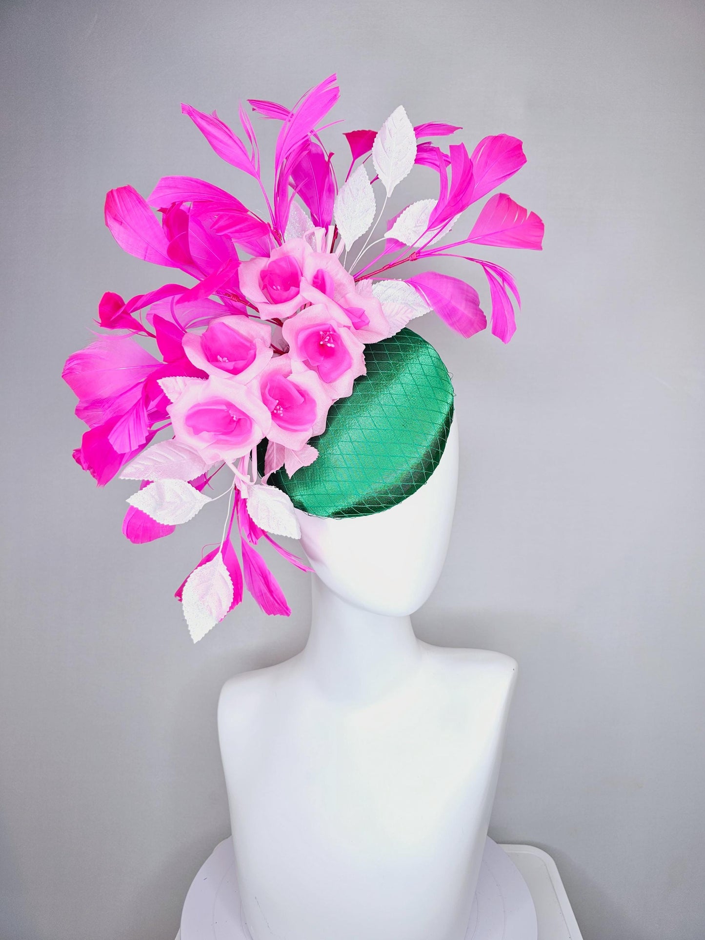 kentucky derby hat fascinator green satin with netting, blush pink satin flowers, light pink leaves, bright pink fuchsia branching feathers