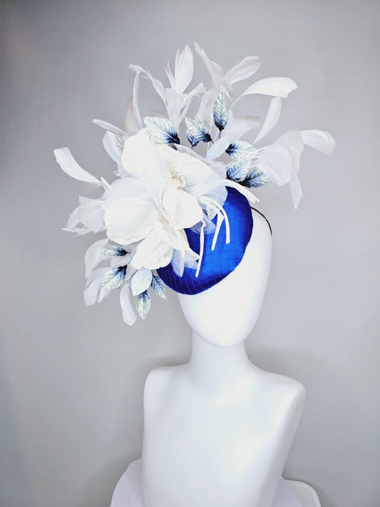 kentucky derby hat fascinator cobalt blue satin with netting,white organza flowers,ombre blue leaves,white and navy blue branching feathers