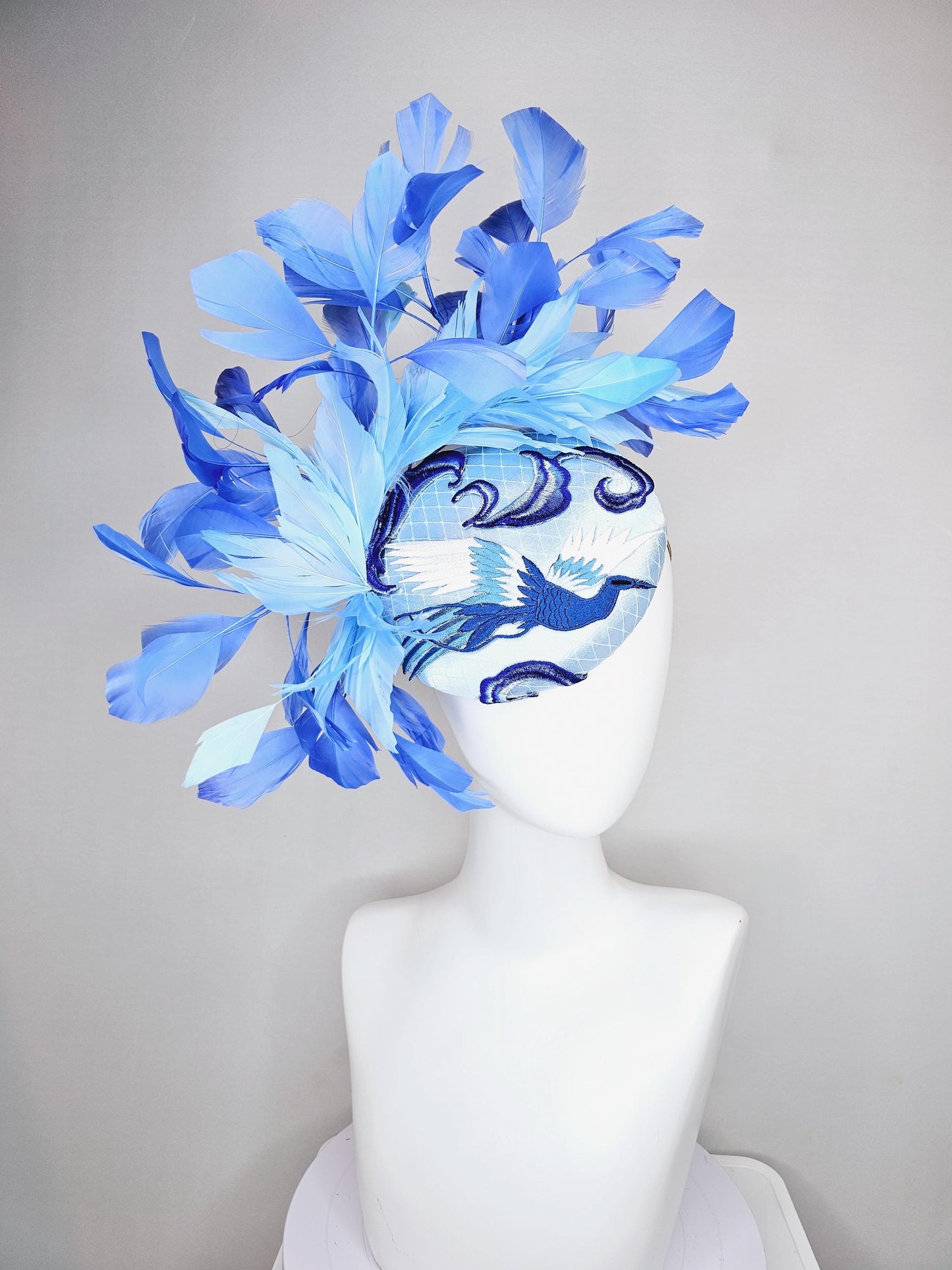 kentucky derby hat fascinator light blue satin with netting embroidered white blue birds, sky blue royal blue cobalt blue branching feathers