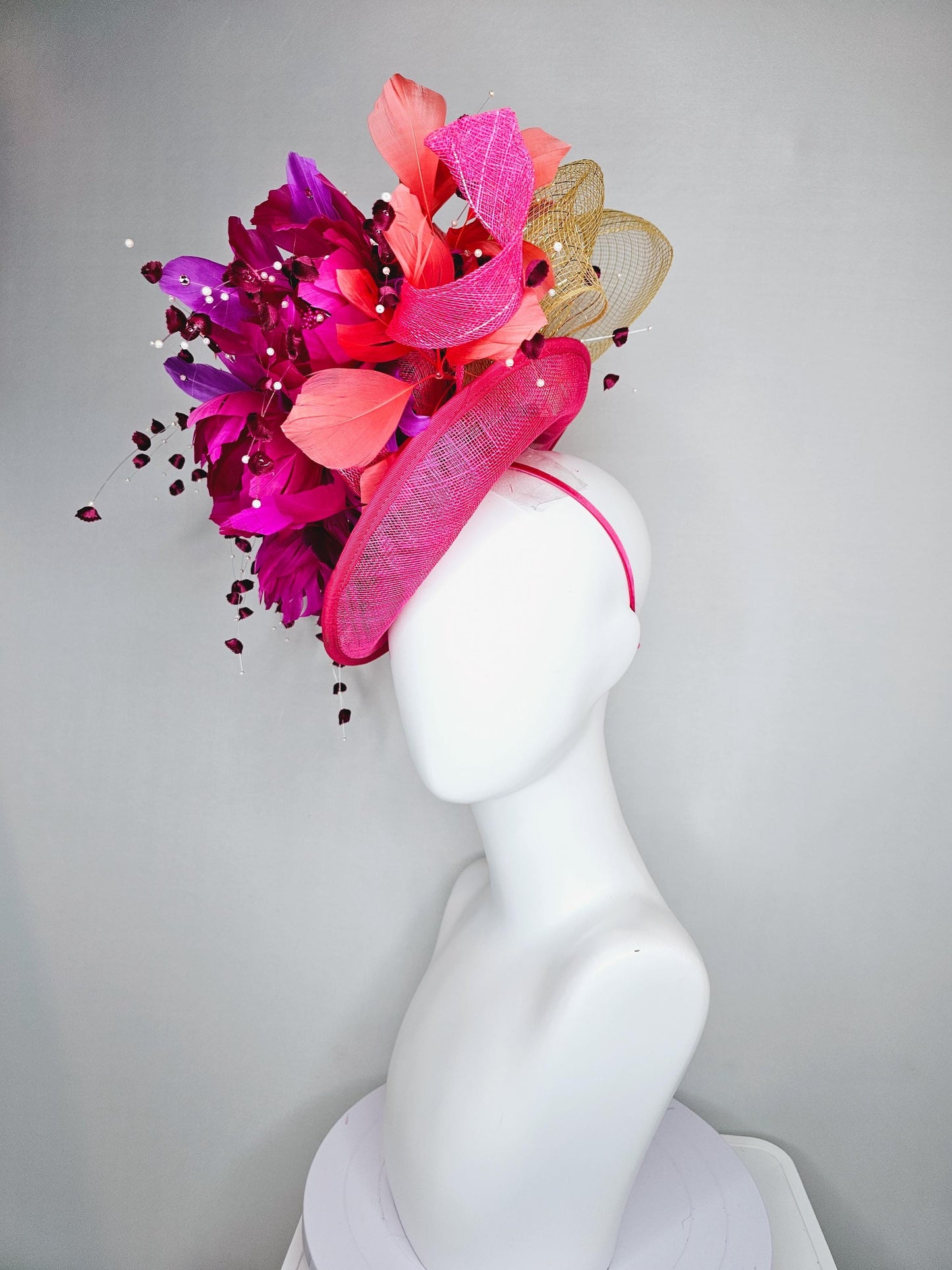 kentucky derby hat fascinator pink sinamay saucer,pink fuchsia feather flowers,pink purple orange branching feathers,pearl and floral stems