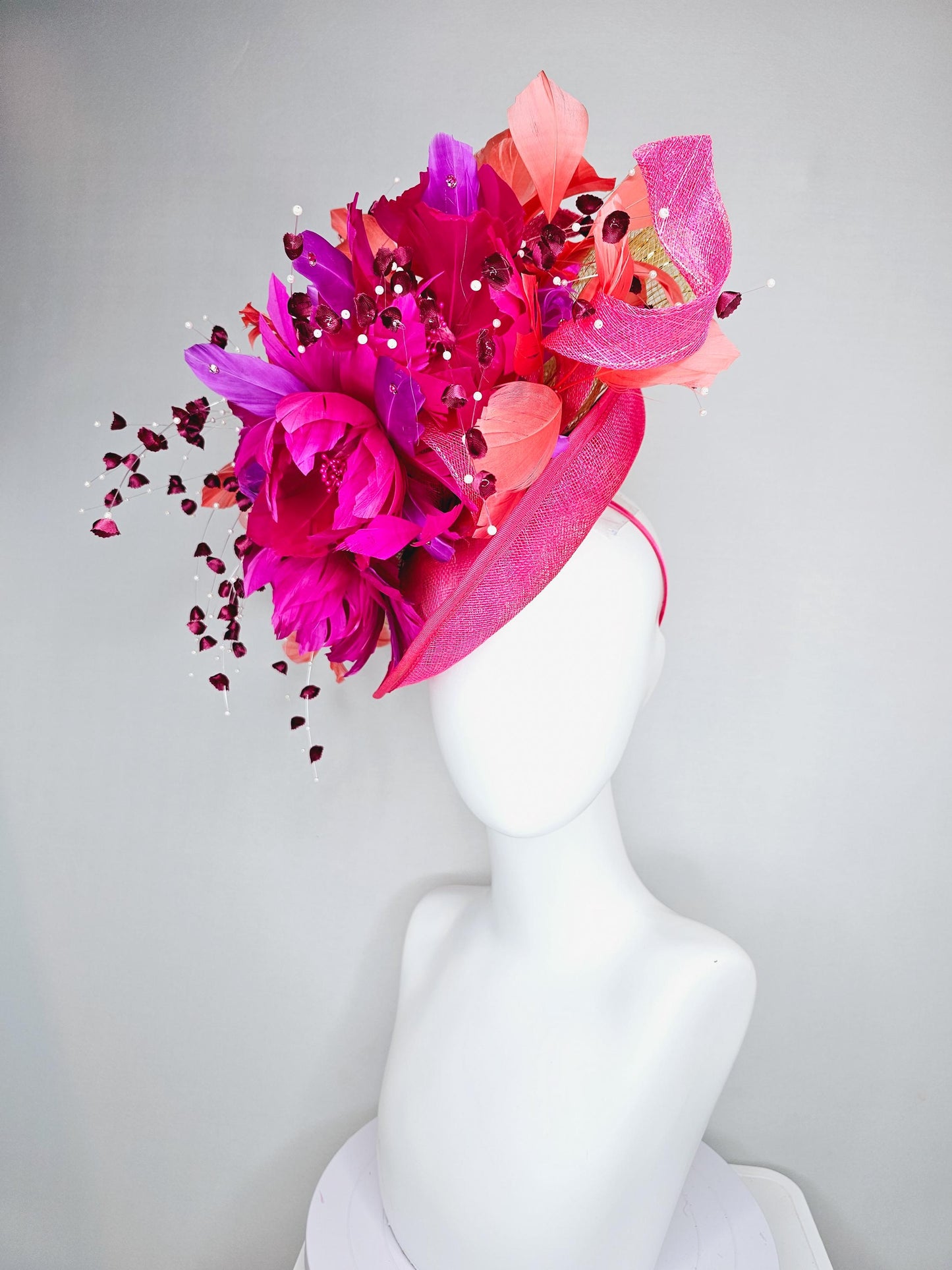 kentucky derby hat fascinator pink sinamay saucer,pink fuchsia feather flowers,pink purple orange branching feathers,pearl and floral stems