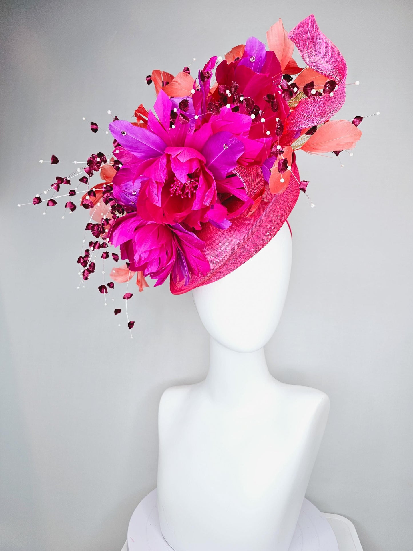 kentucky derby hat fascinator pink sinamay saucer,pink fuchsia feather flowers,pink purple orange branching feathers,pearl and floral stems