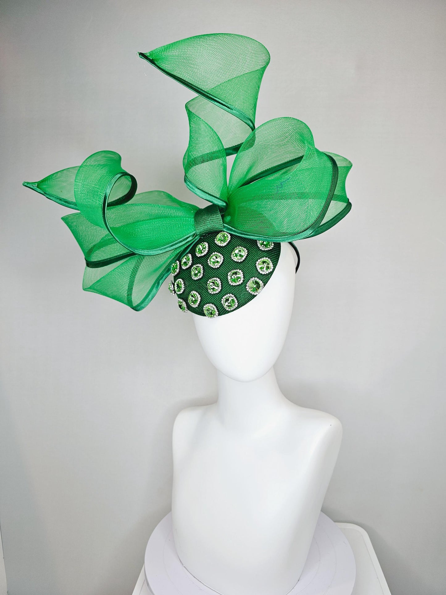 kentucky derby hat fascinator green sinamay with green crystal jewels, emerald green mesh and wired ribbon large bendable bow decor