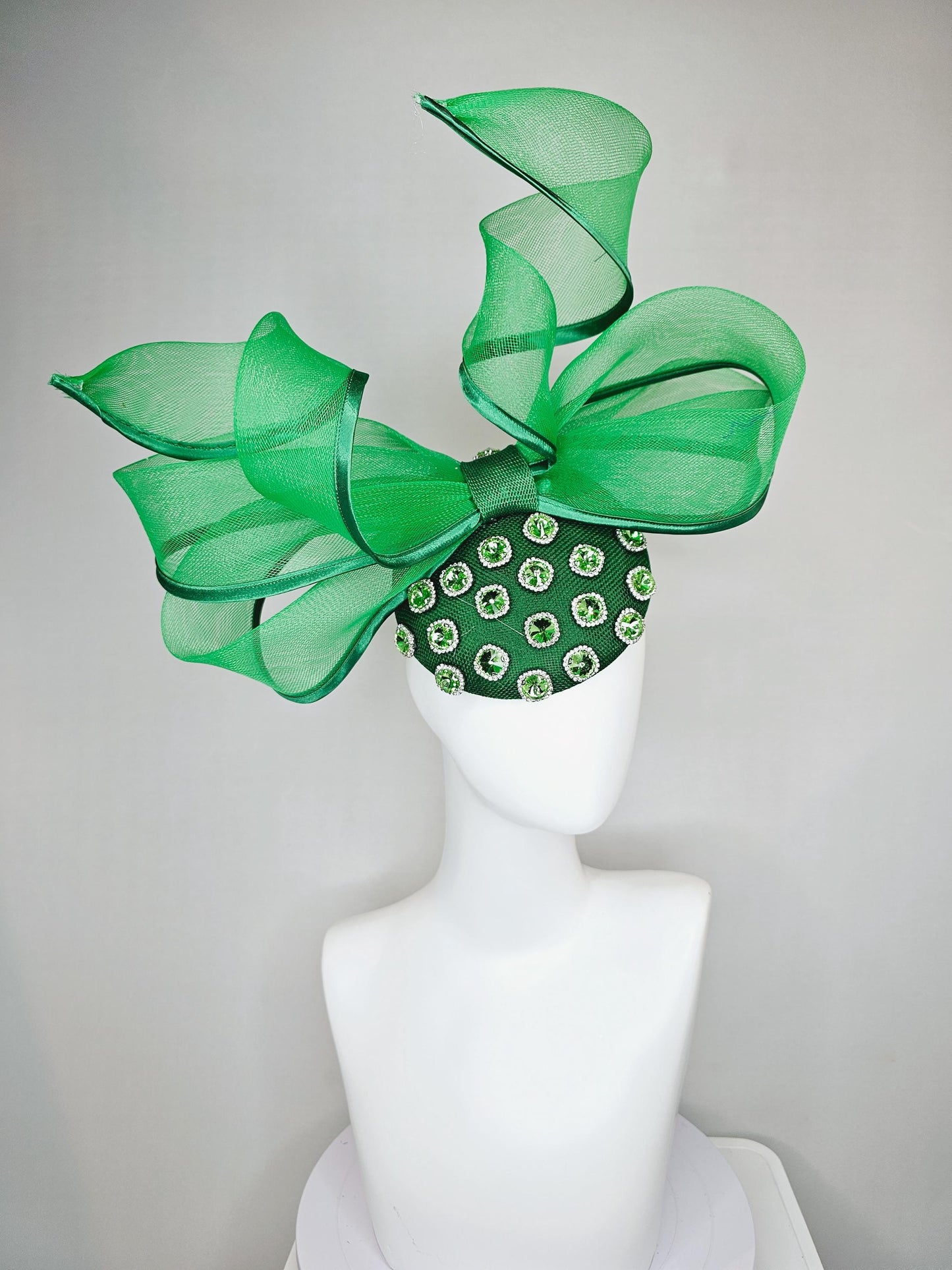 kentucky derby hat fascinator green sinamay with green crystal jewels, emerald green mesh and wired ribbon large bendable bow decor