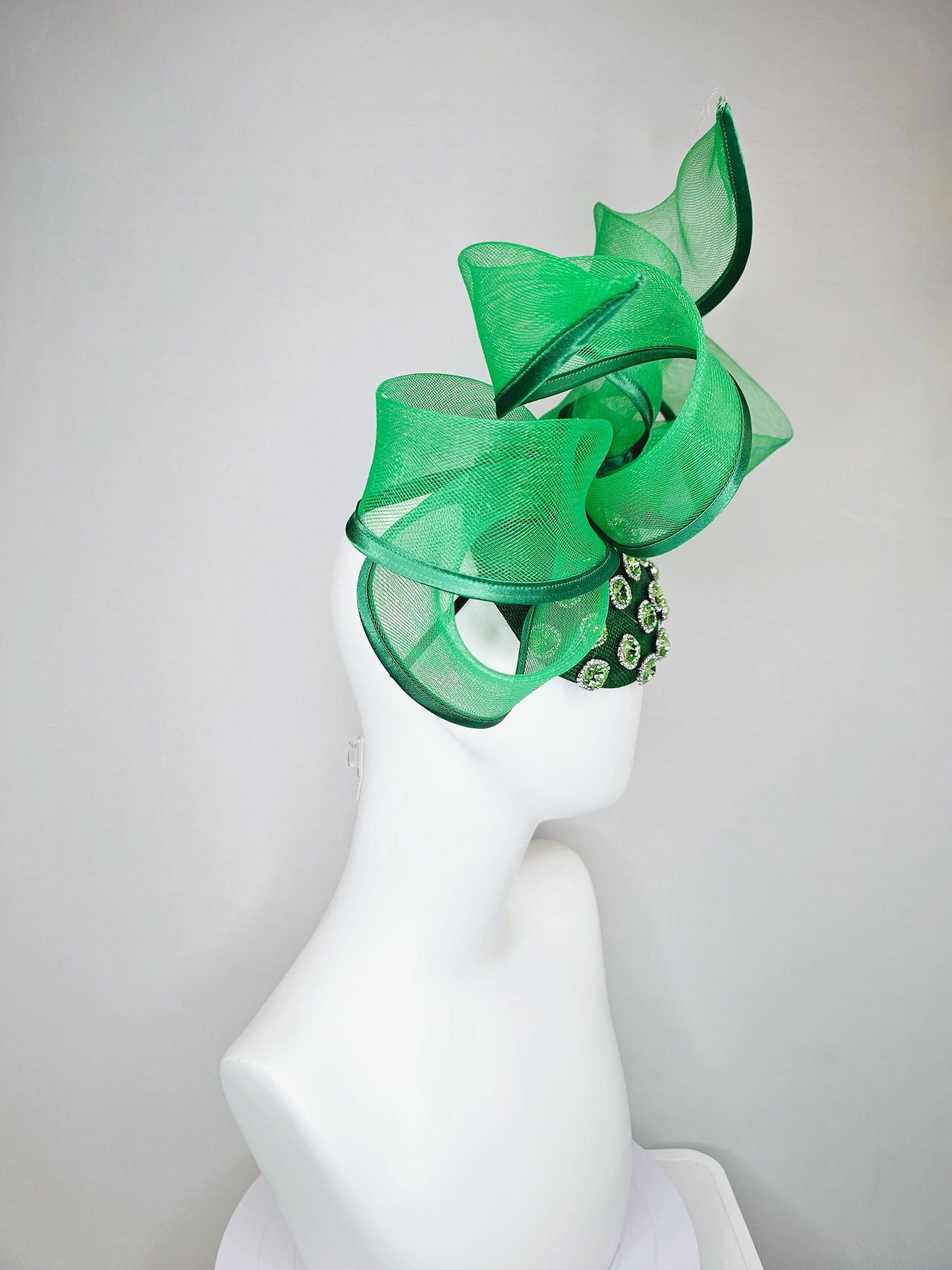 kentucky derby hat fascinator green sinamay with green crystal jewels, emerald green mesh and wired ribbon large bendable bow decor