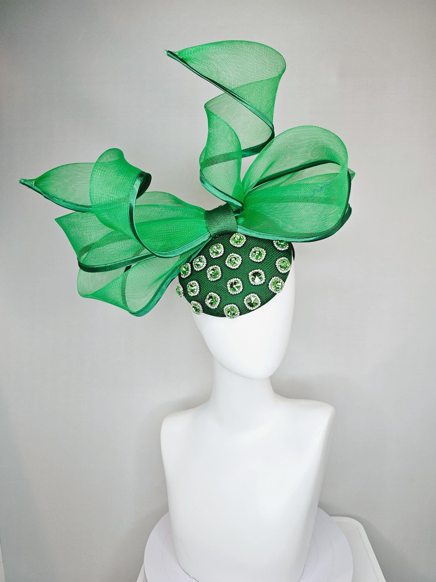 kentucky derby hat fascinator green sinamay with green crystal jewels, emerald green mesh and wired ribbon large bendable bow decor