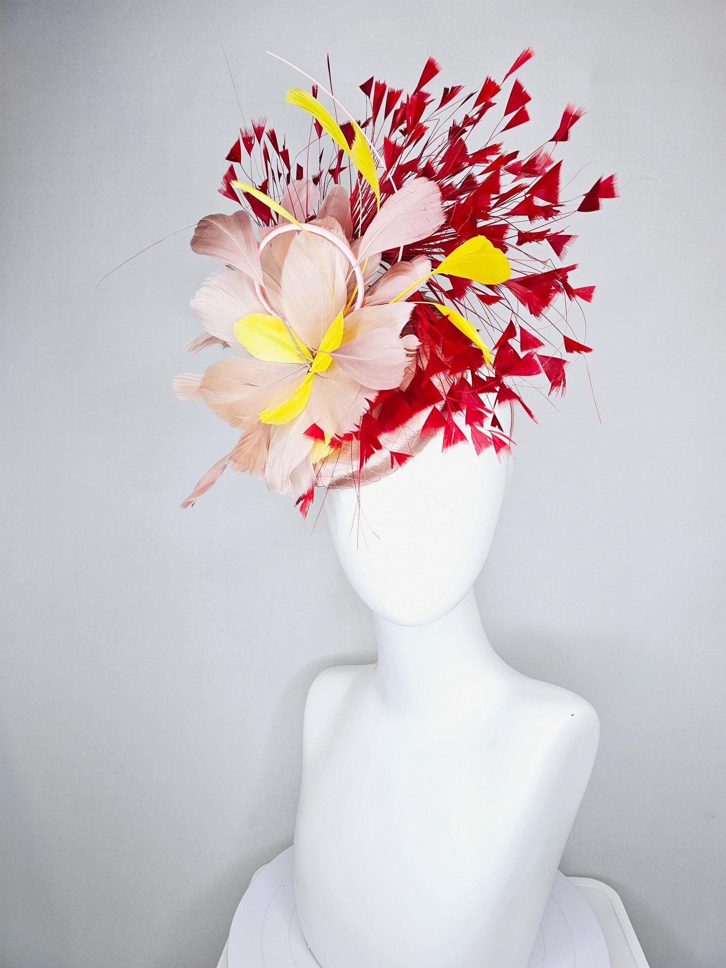 kentucky derby hat fascinator neutral beige pink satin with netting and fluffy neutral beige pink, yellow, scarlet red branching feathers