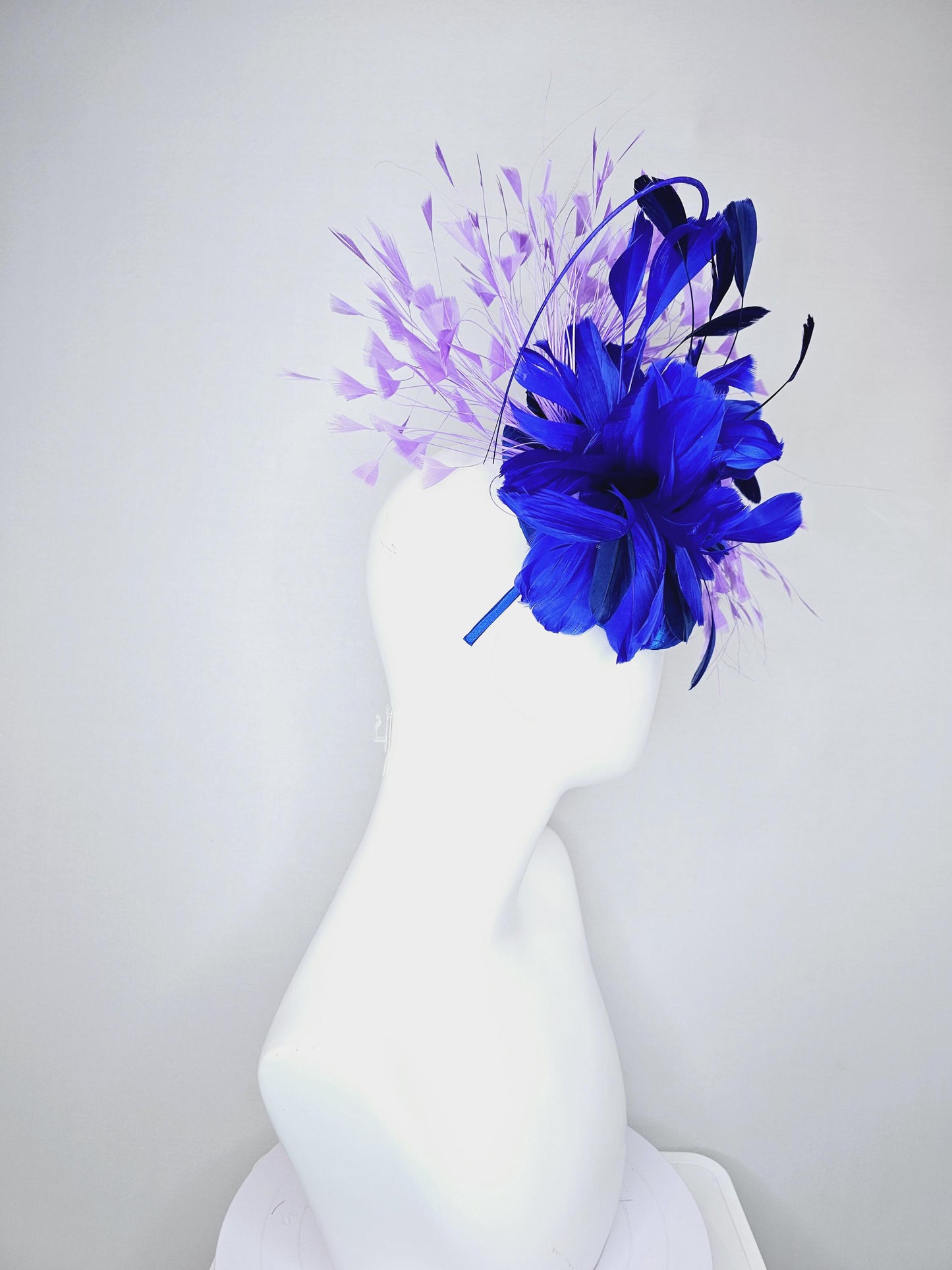 kentucky derby hat fascinator royal blue satin with netting, fluffy royal blue, navy blue, lavender purple branching feathers