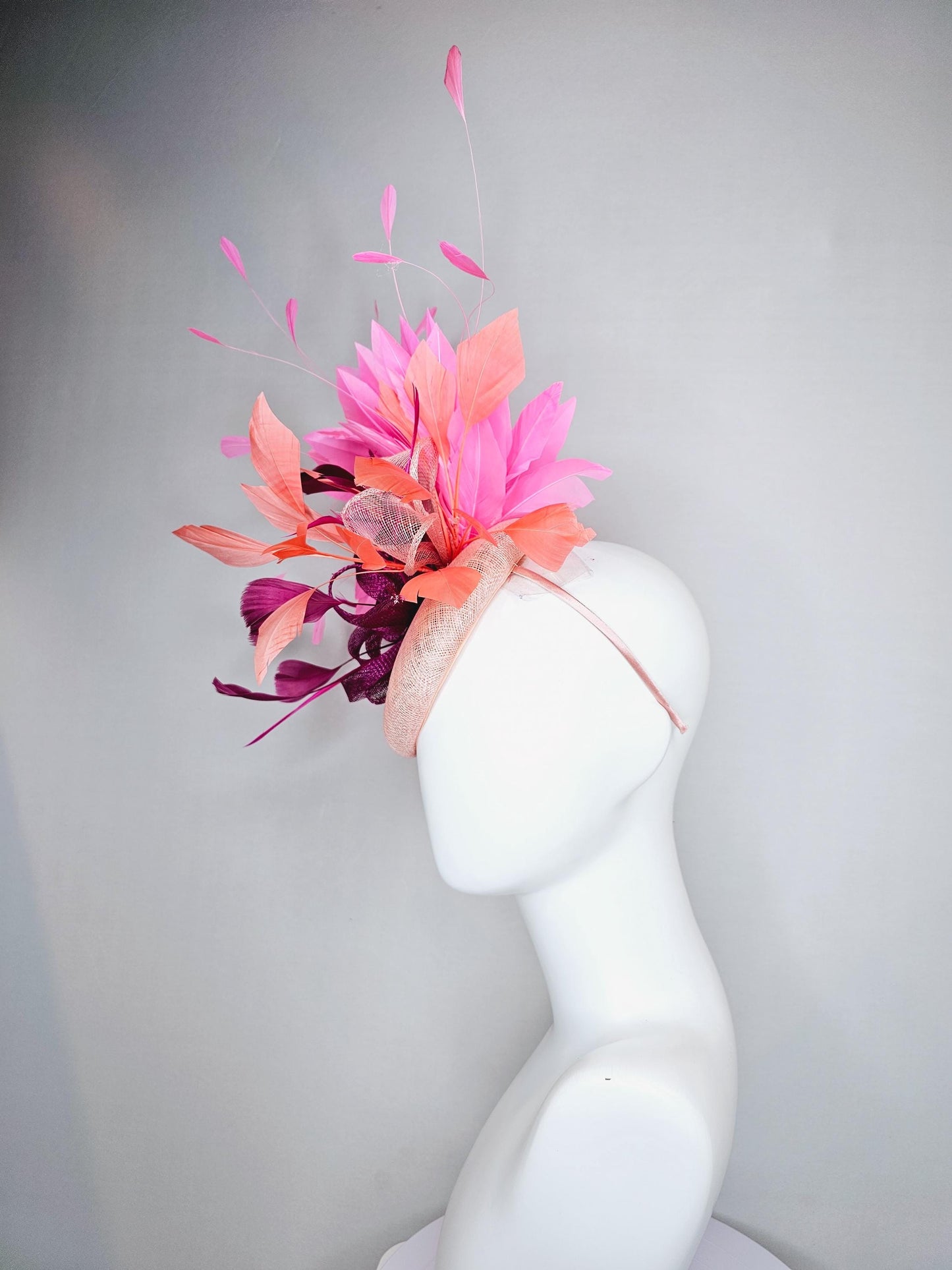 kentucky derby hat fascinator light pink sinamay w/ magenta purple sinamay bow and feathers, blush pink and coral orange branching feathers