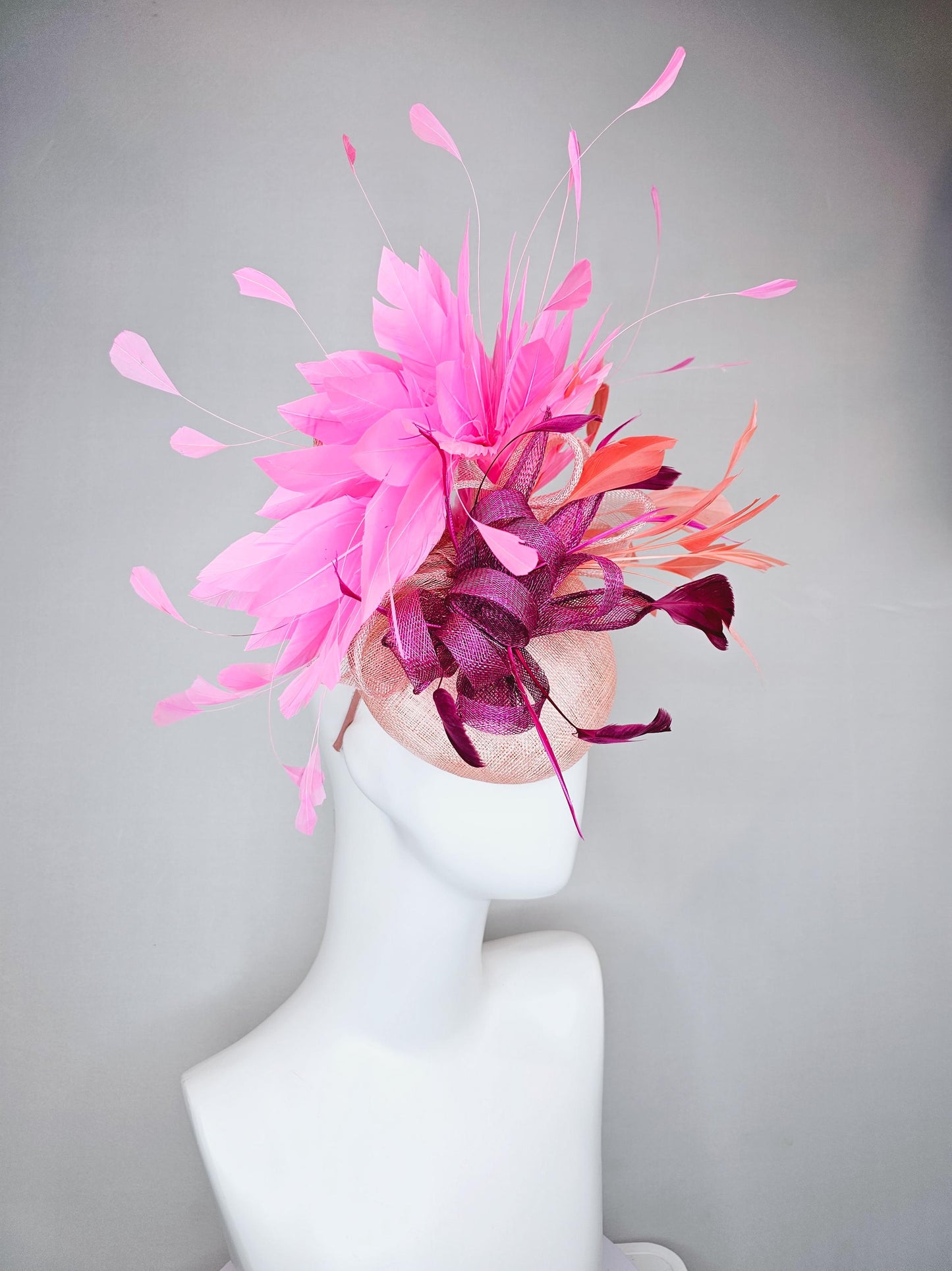 kentucky derby hat fascinator light pink sinamay w/ magenta purple sinamay bow and feathers, blush pink and coral orange branching feathers