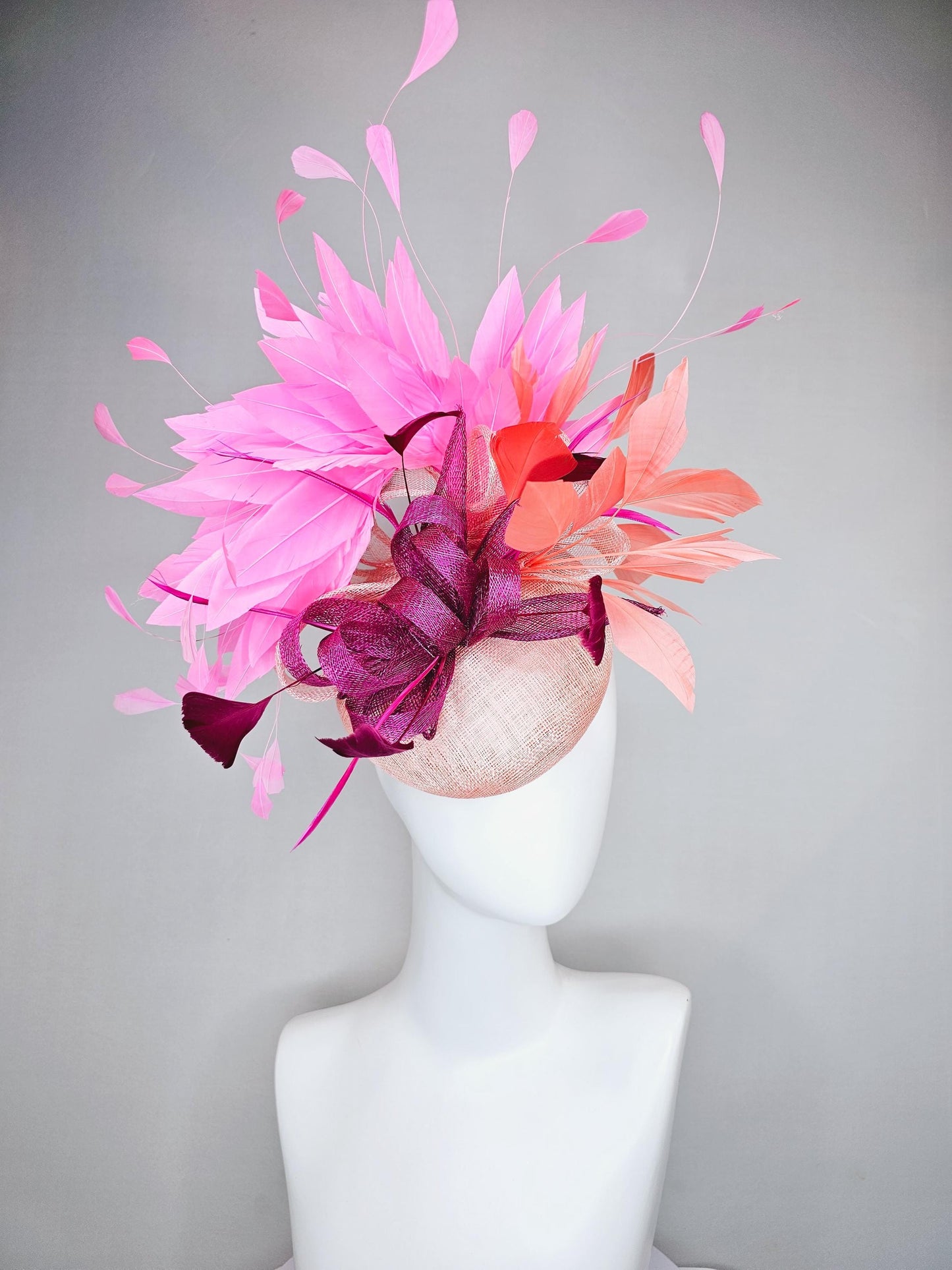 kentucky derby hat fascinator light pink sinamay w/ magenta purple sinamay bow and feathers, blush pink and coral orange branching feathers