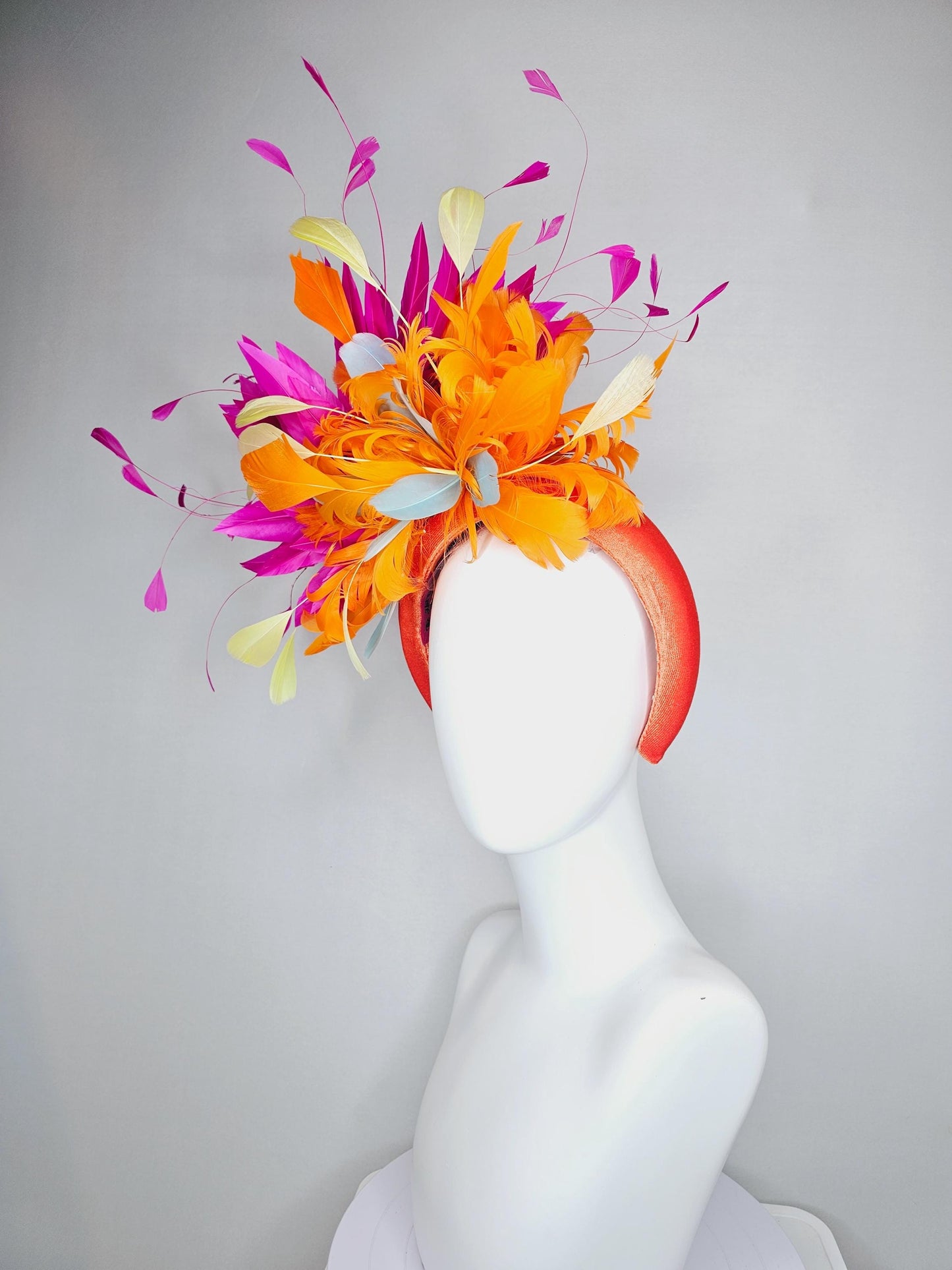 kentucky derby hat fascinator orange velvet headband, fluffy tangerine orange, light yellow, silver gray, fuchsia pink branching feathers