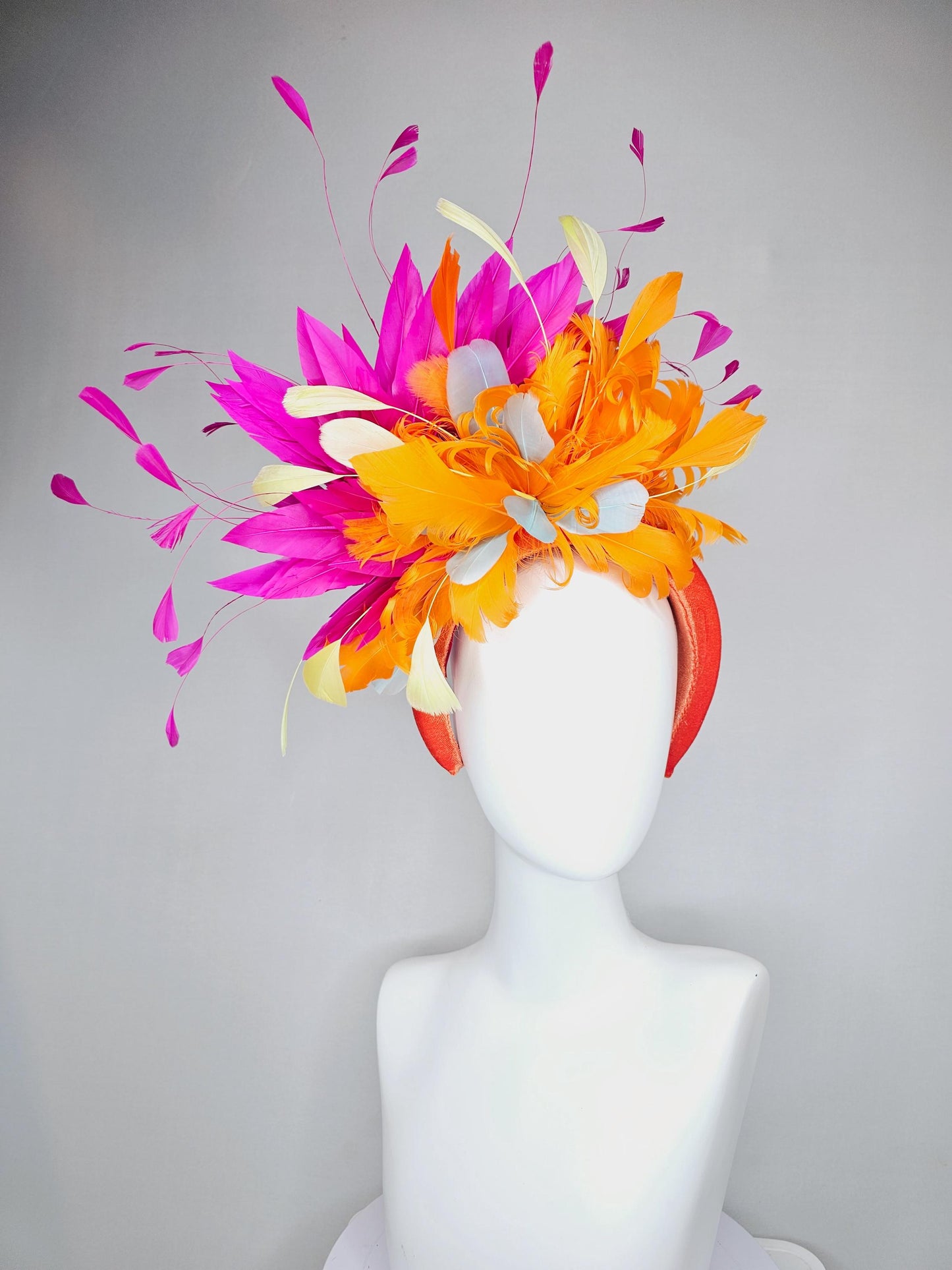 kentucky derby hat fascinator orange velvet headband, fluffy tangerine orange, light yellow, silver gray, fuchsia pink branching feathers