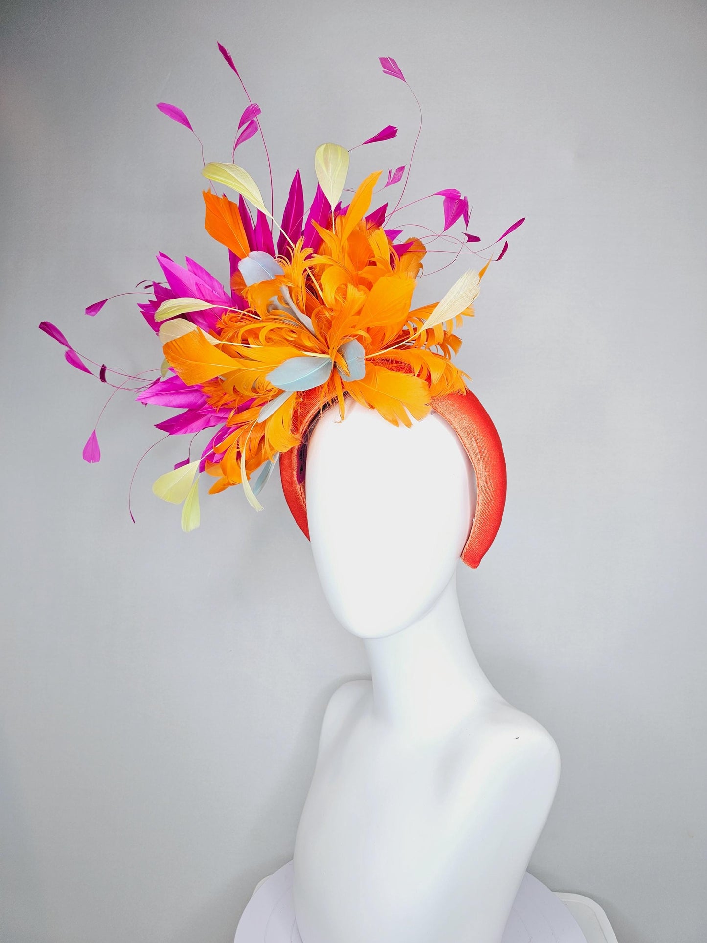 kentucky derby hat fascinator orange velvet headband, fluffy tangerine orange, light yellow, silver gray, fuchsia pink branching feathers