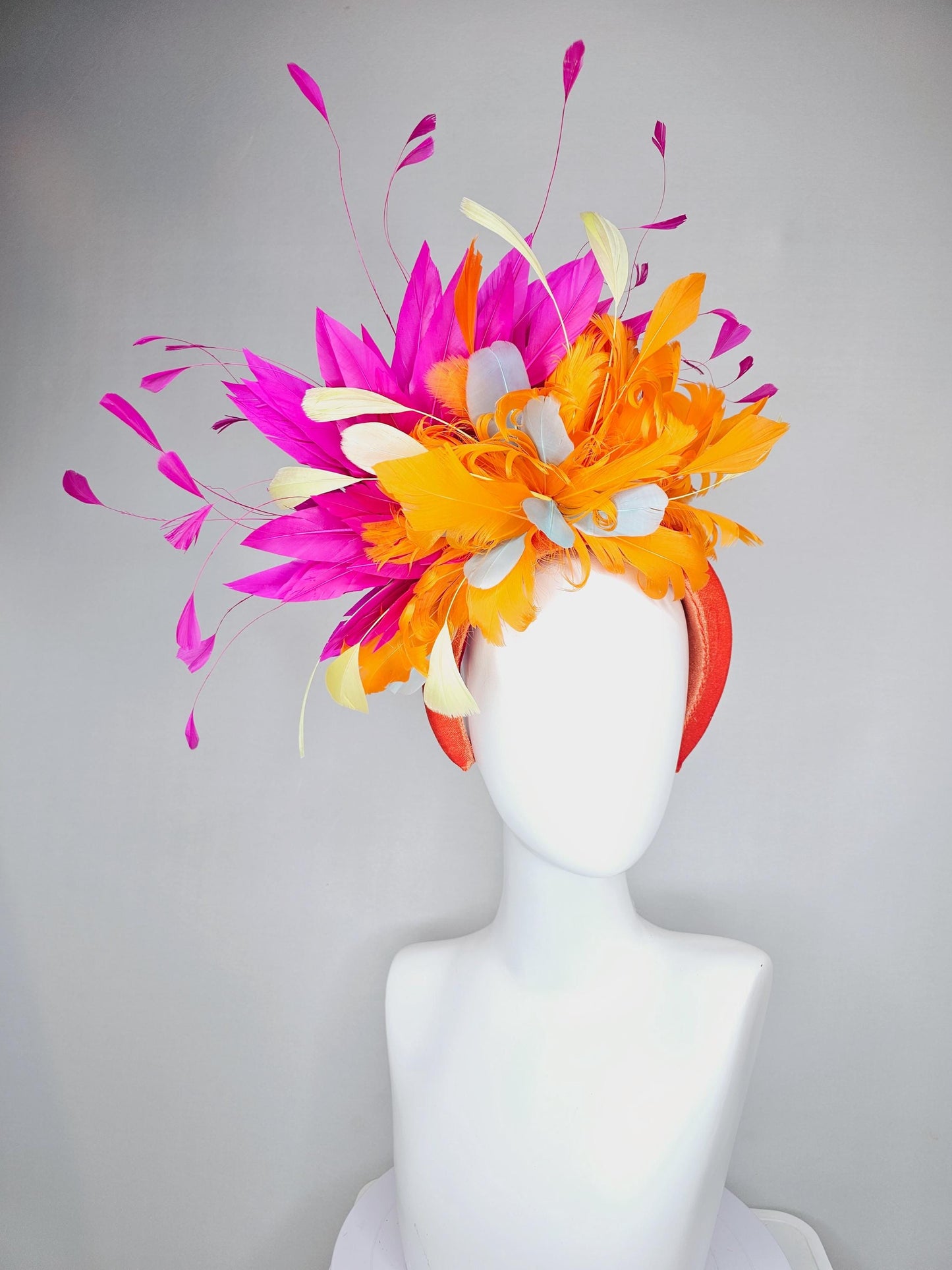 kentucky derby hat fascinator orange velvet headband, fluffy tangerine orange, light yellow, silver gray, fuchsia pink branching feathers