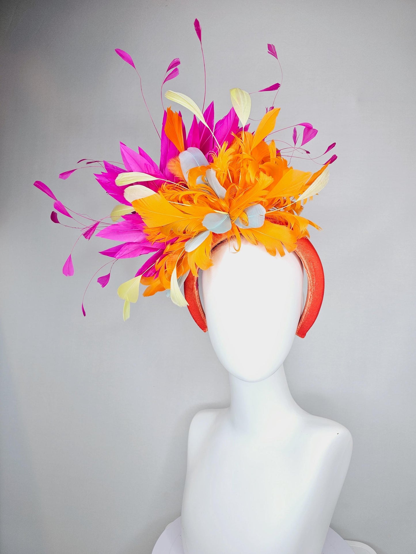 kentucky derby hat fascinator orange velvet headband, fluffy tangerine orange, light yellow, silver gray, fuchsia pink branching feathers