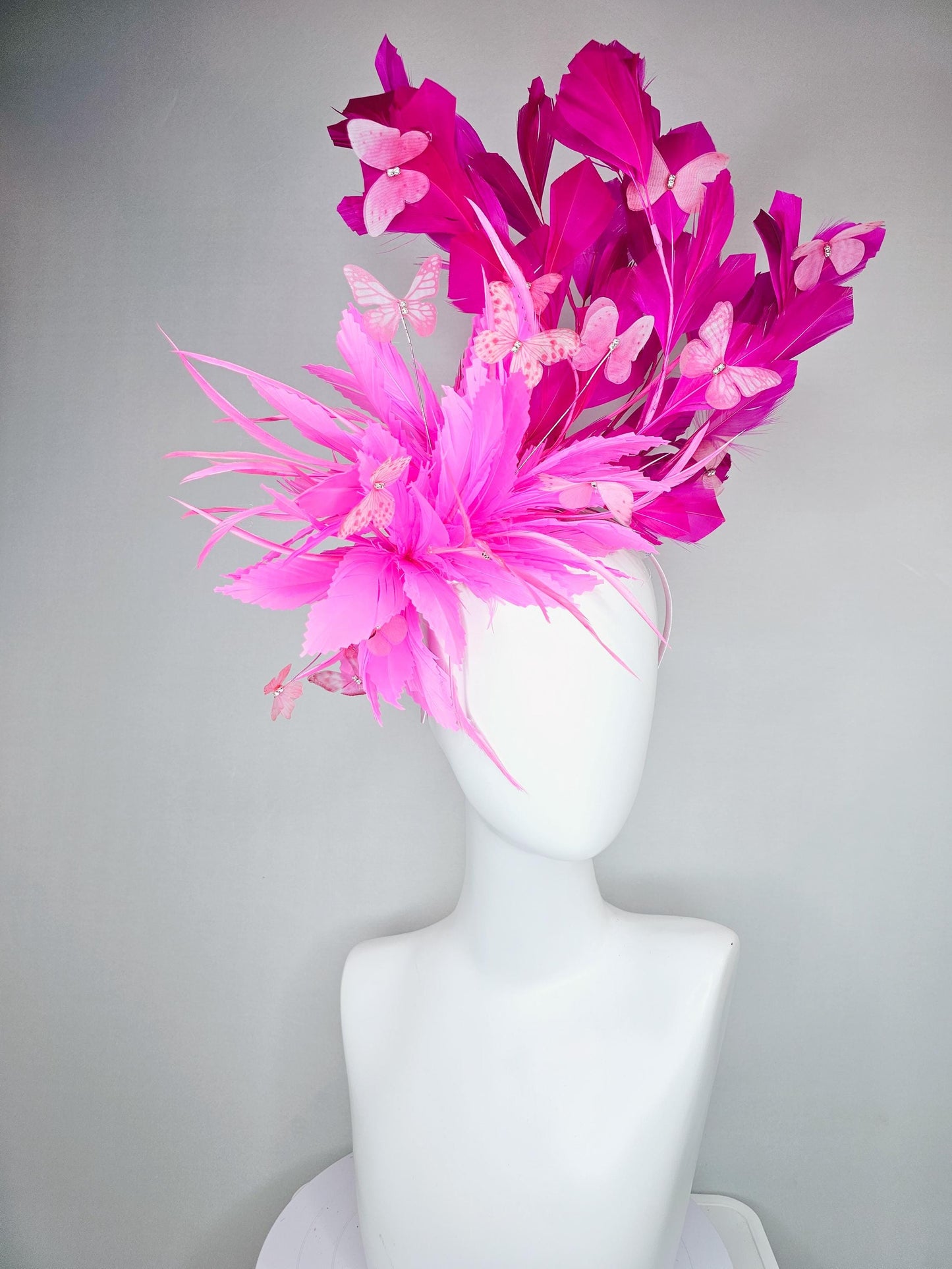 kentucky derby hat fascinator with fluffy pink zigzag feather, bright fuchsia pink branching feathers and pink butterflies