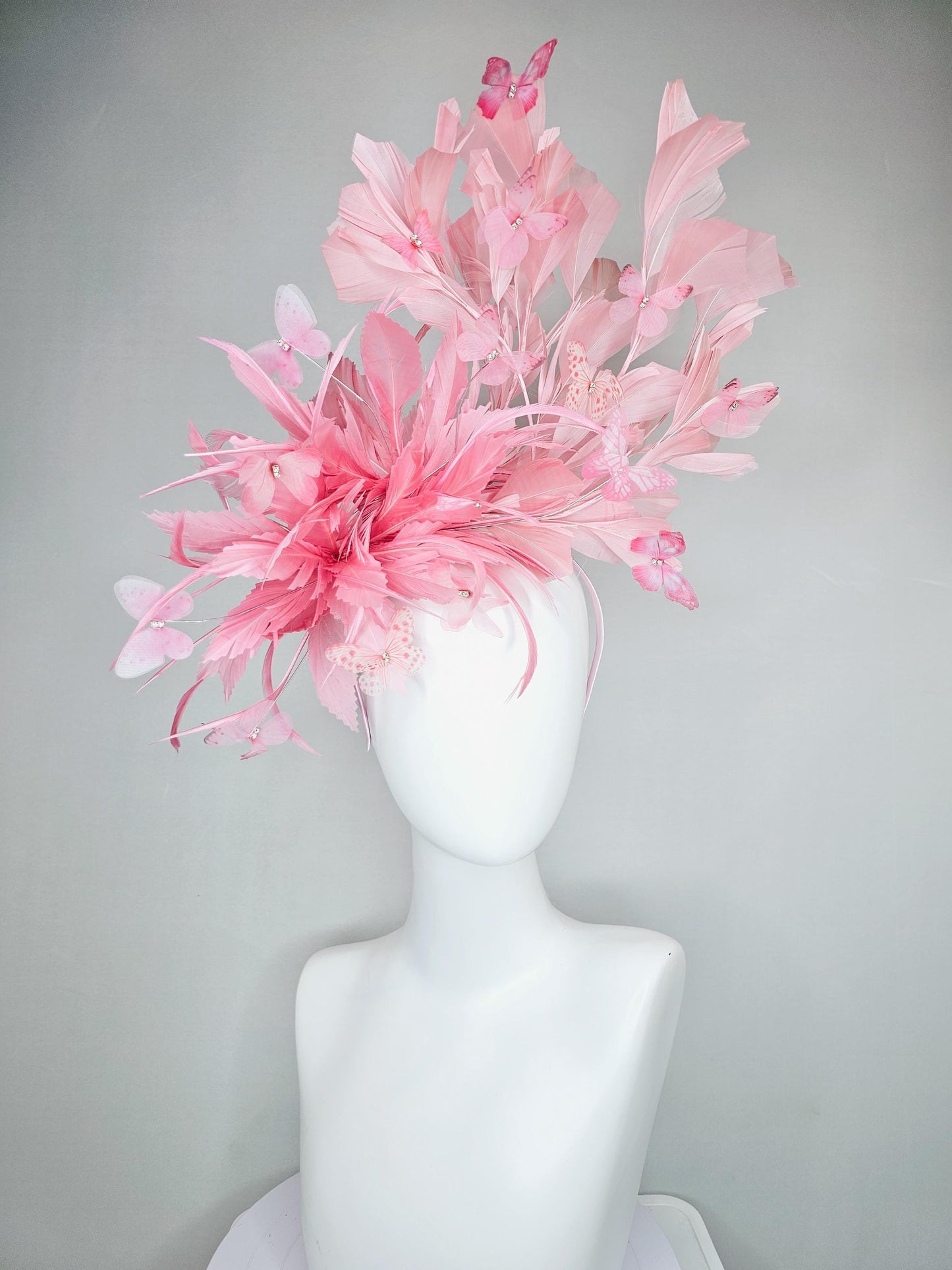 kentucky derby hat fascinator with fluffy light blush pink zigzag feather, light blush pink branching feathers, light blush pink butterflies