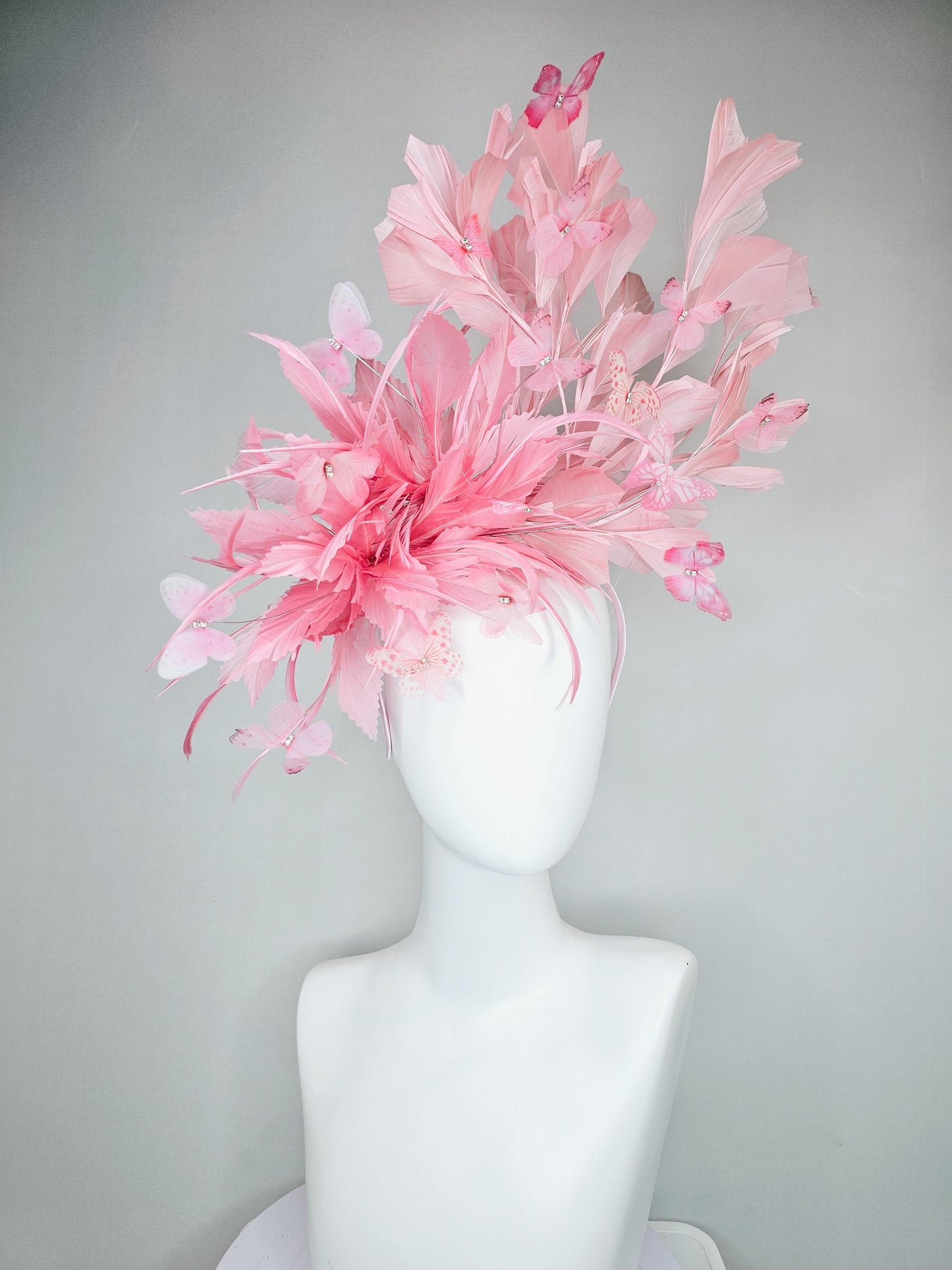 kentucky derby hat fascinator with fluffy light blush pink zigzag feather, light blush pink branching feathers, light blush pink butterflies