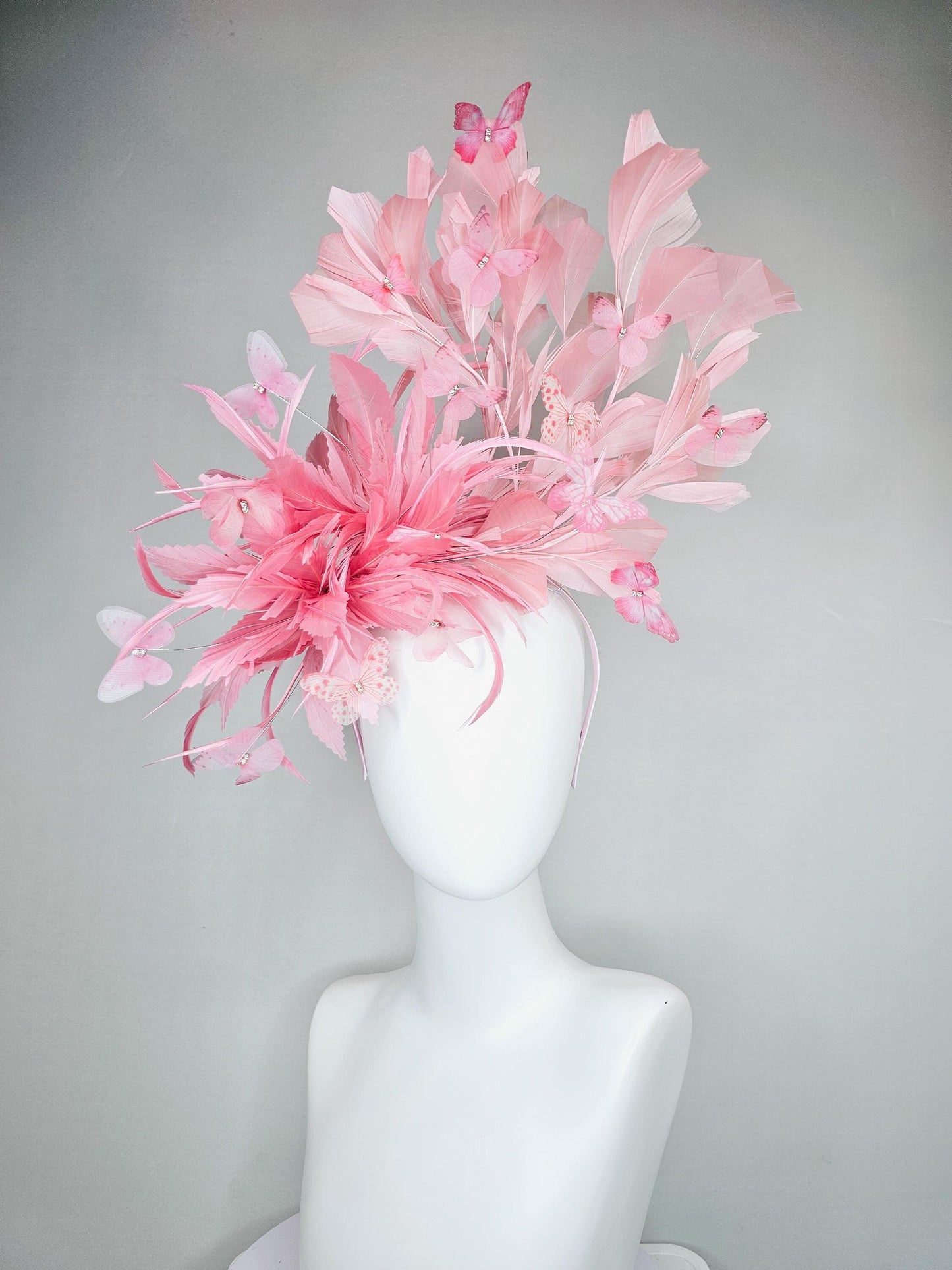 kentucky derby hat fascinator with fluffy light blush pink zigzag feather, light blush pink branching feathers, light blush pink butterflies