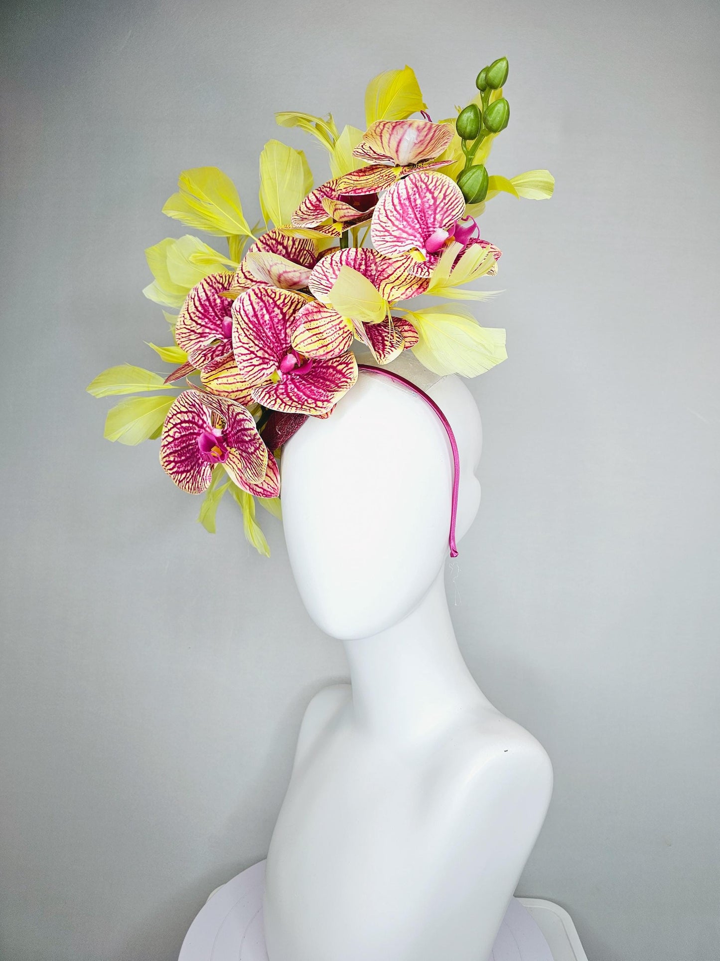 kentucky derby hat fascinator pink magenta and yellow orchid satin silk flowers, yellow branching feathers