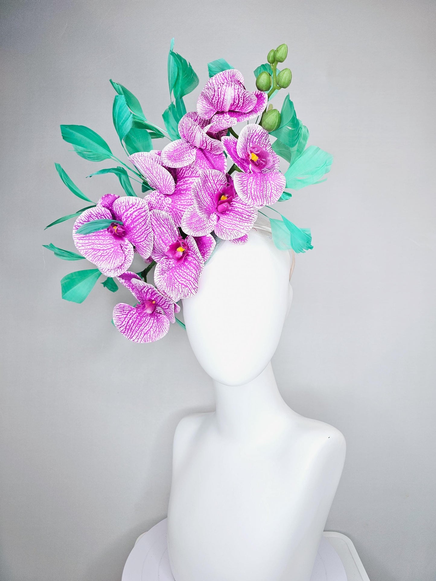 kentucky derby hat fascinator white and purple orchid satin silk flowers, bright mint green branching feathers