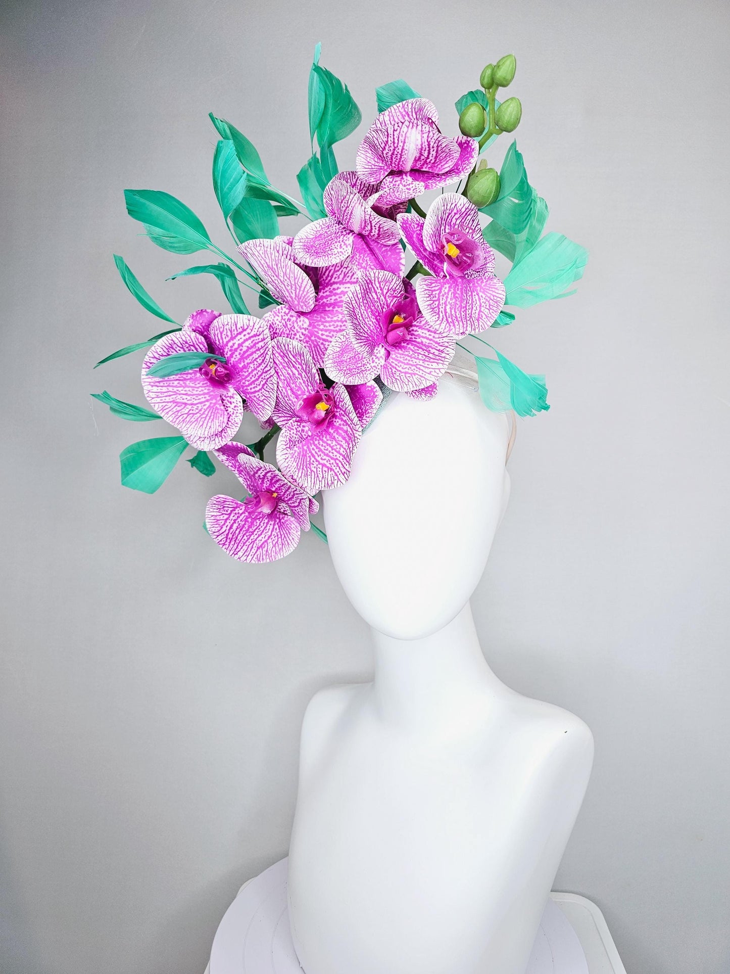 kentucky derby hat fascinator white and purple orchid satin silk flowers, bright mint green branching feathers