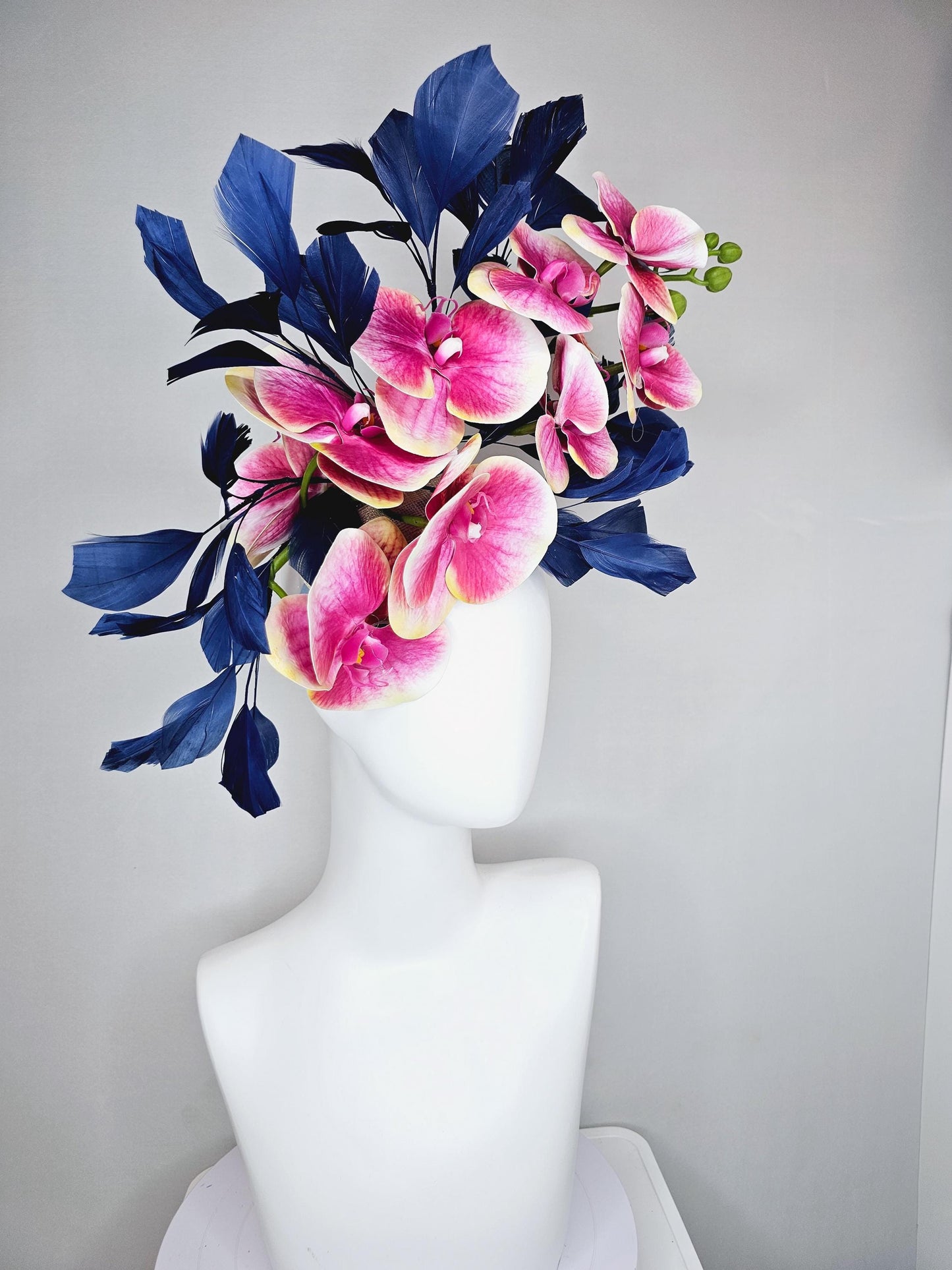 kentucky derby hat fascinator large white yellow and pink orchid satin silk flowers, navy blue branching feathers