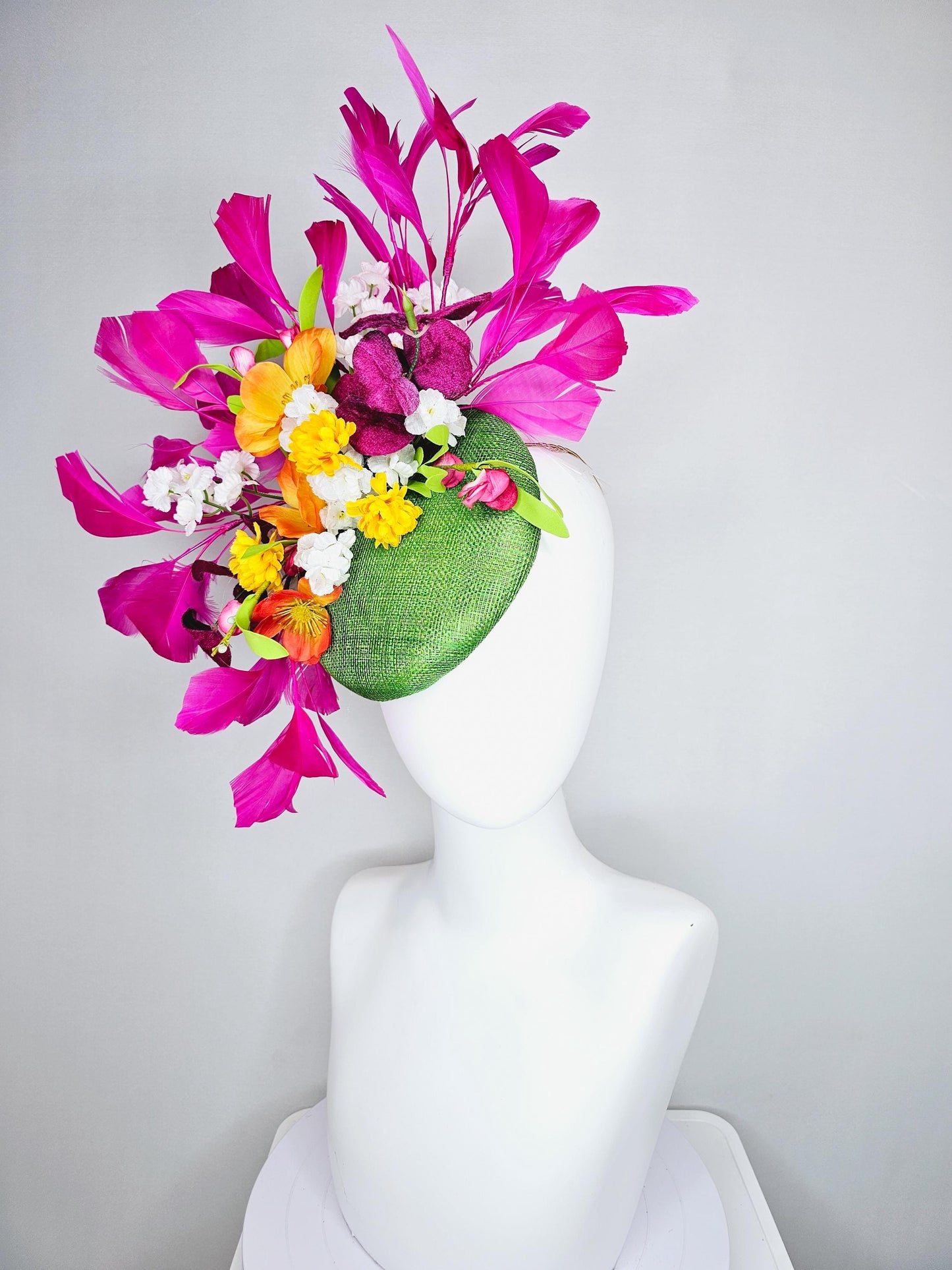 kentucky derby hat fascinator lime green sinamay with yellow orange white pink satin flowers, green leaves, fuchsia pink branching feathers