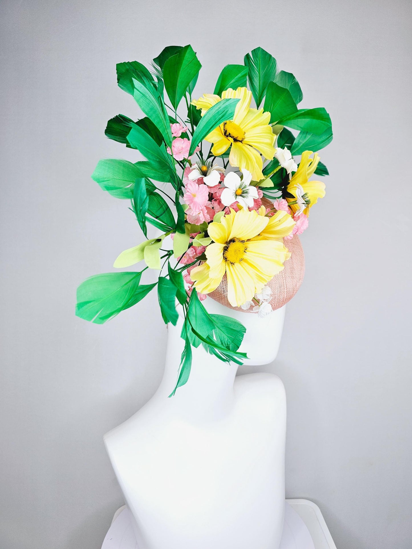 kentucky derby hat fascinator light pink sinamay with yellow white blush pink satin flowers, green leaves, emerald green branching feathers