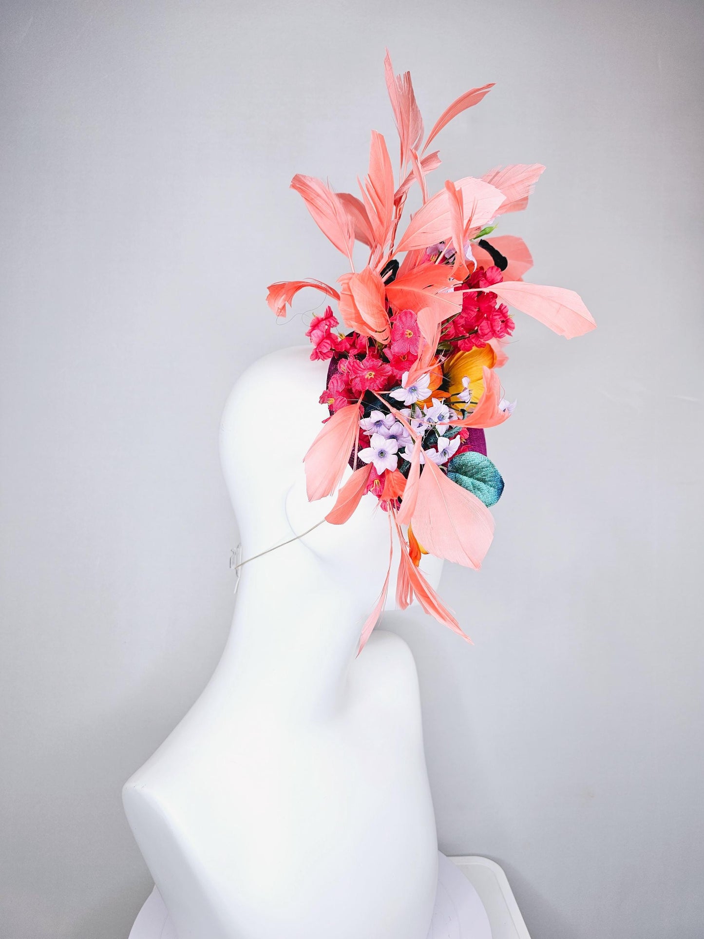 kentucky derby hat fascinator magenta purple sinamay, orange cherry red white satin flowers,teal blue leaves,coral orange branching feathers