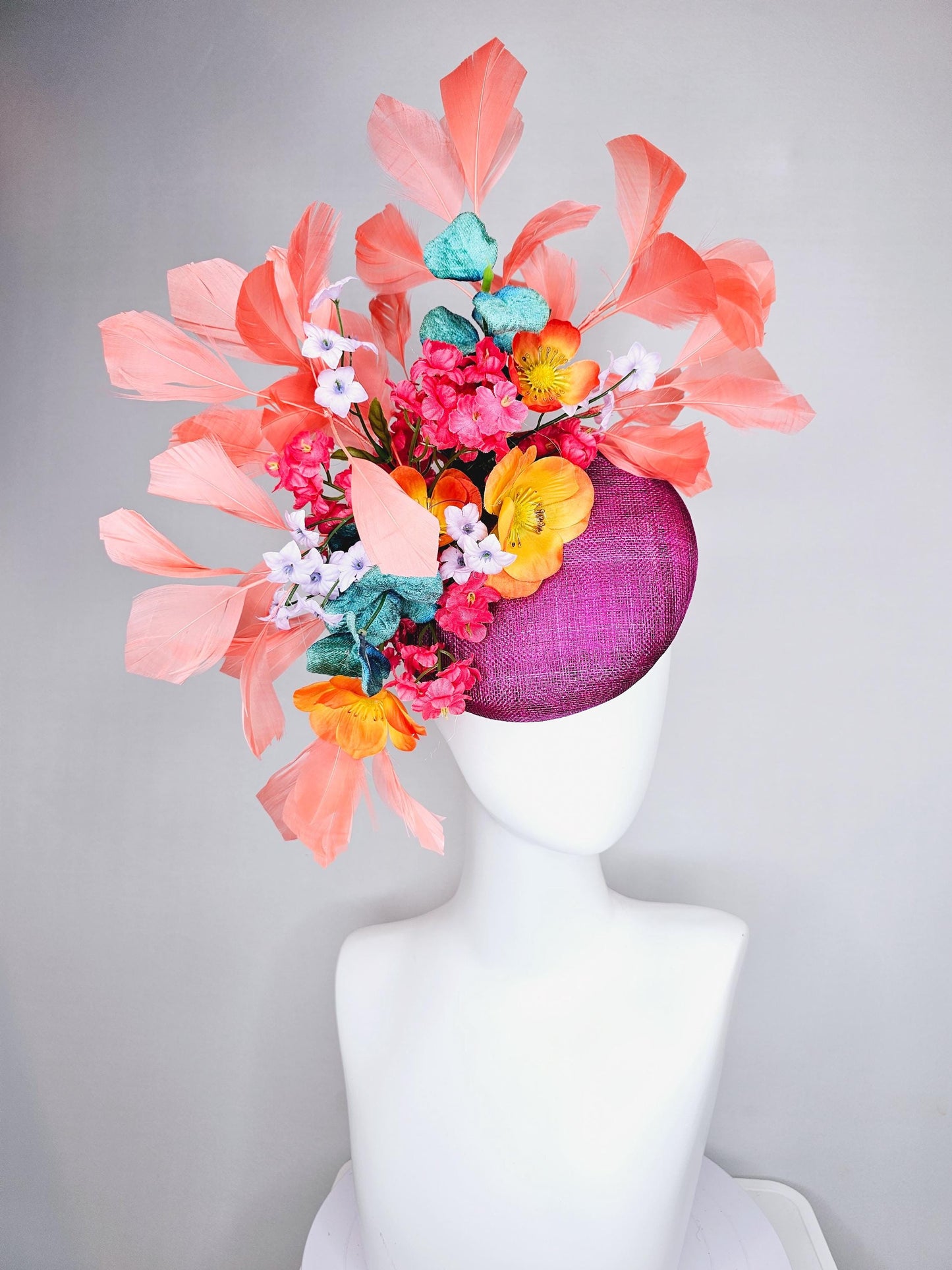 kentucky derby hat fascinator magenta purple sinamay, orange cherry red white satin flowers,teal blue leaves,coral orange branching feathers