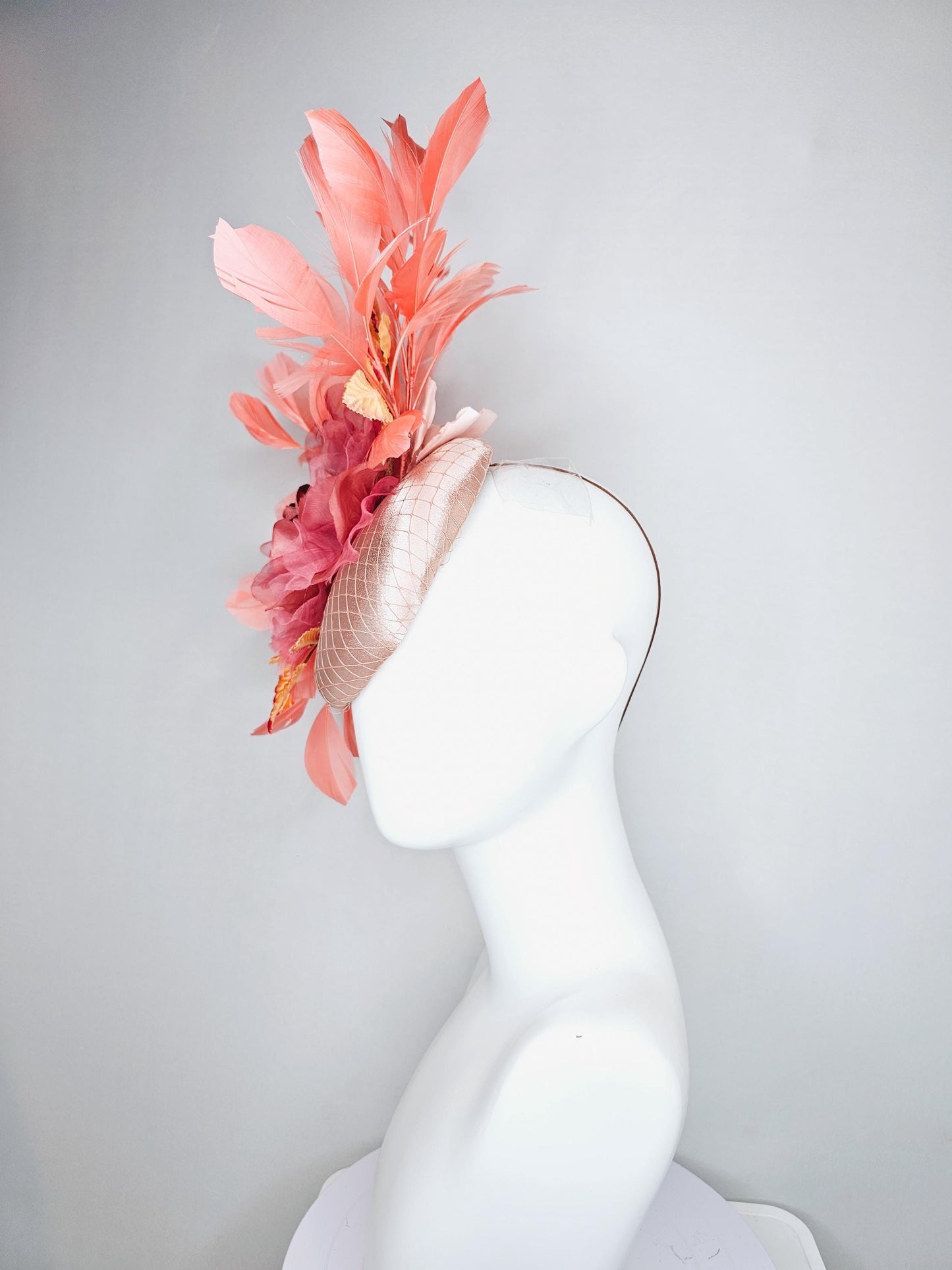 kentucky derby hat fascinator light pink satin w/ netting, dusty pink organza flower,yellow and pink leaves, peach orange branching feathers