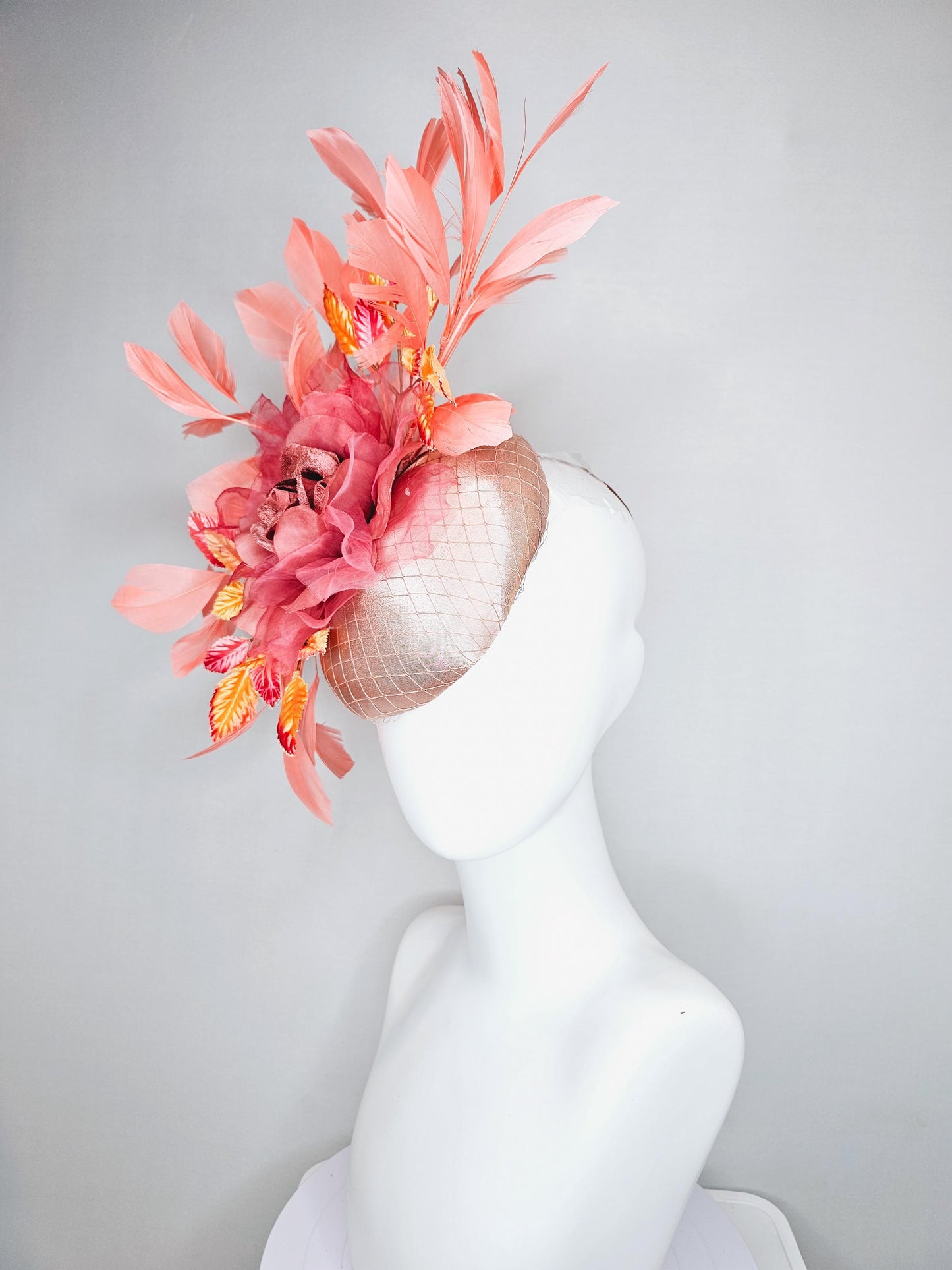 kentucky derby hat fascinator light pink satin w/ netting, dusty pink organza flower,yellow and pink leaves, peach orange branching feathers